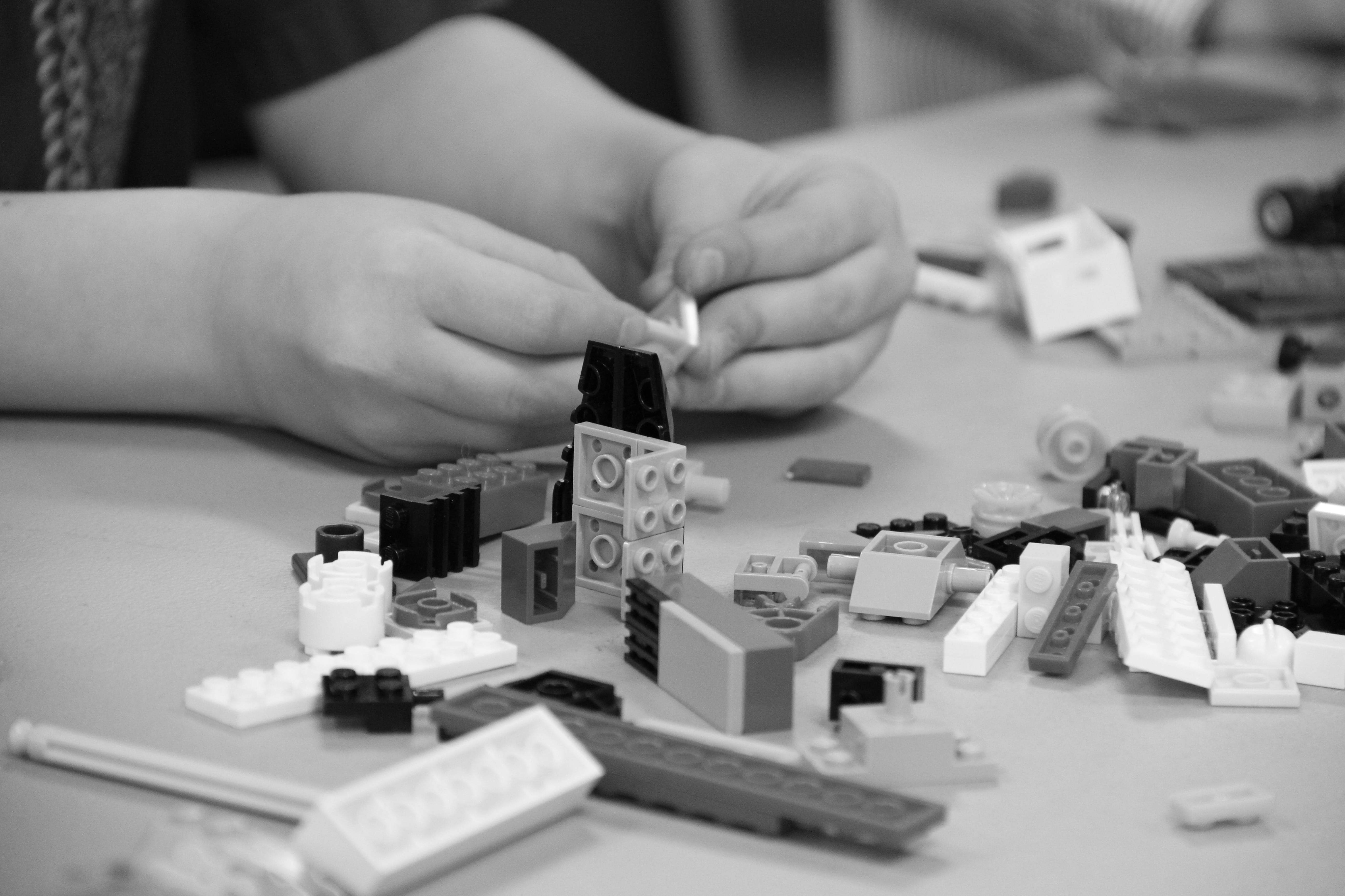 holding, relaxation, building, construction, large group of objects, hand, one person, toy, table, grayscale, body part, plastic, creative, architecture, HD Wallpaper