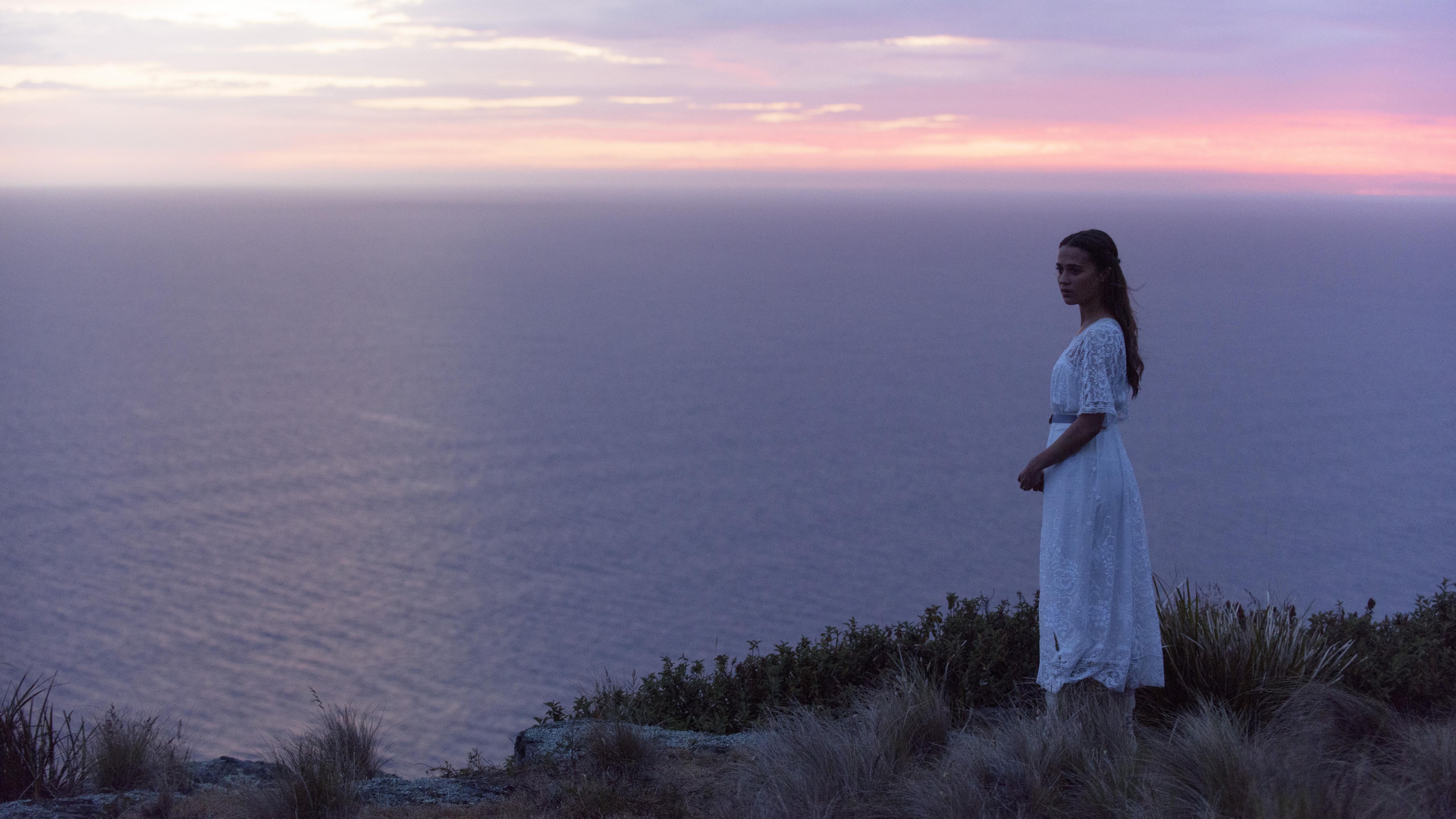 wearing, dress, The Light Between Oceans, near, white, Michael Fassbender, woman, best movies of 2016, ocean, Alicia Vikander, 8K, standing, HD Wallpaper