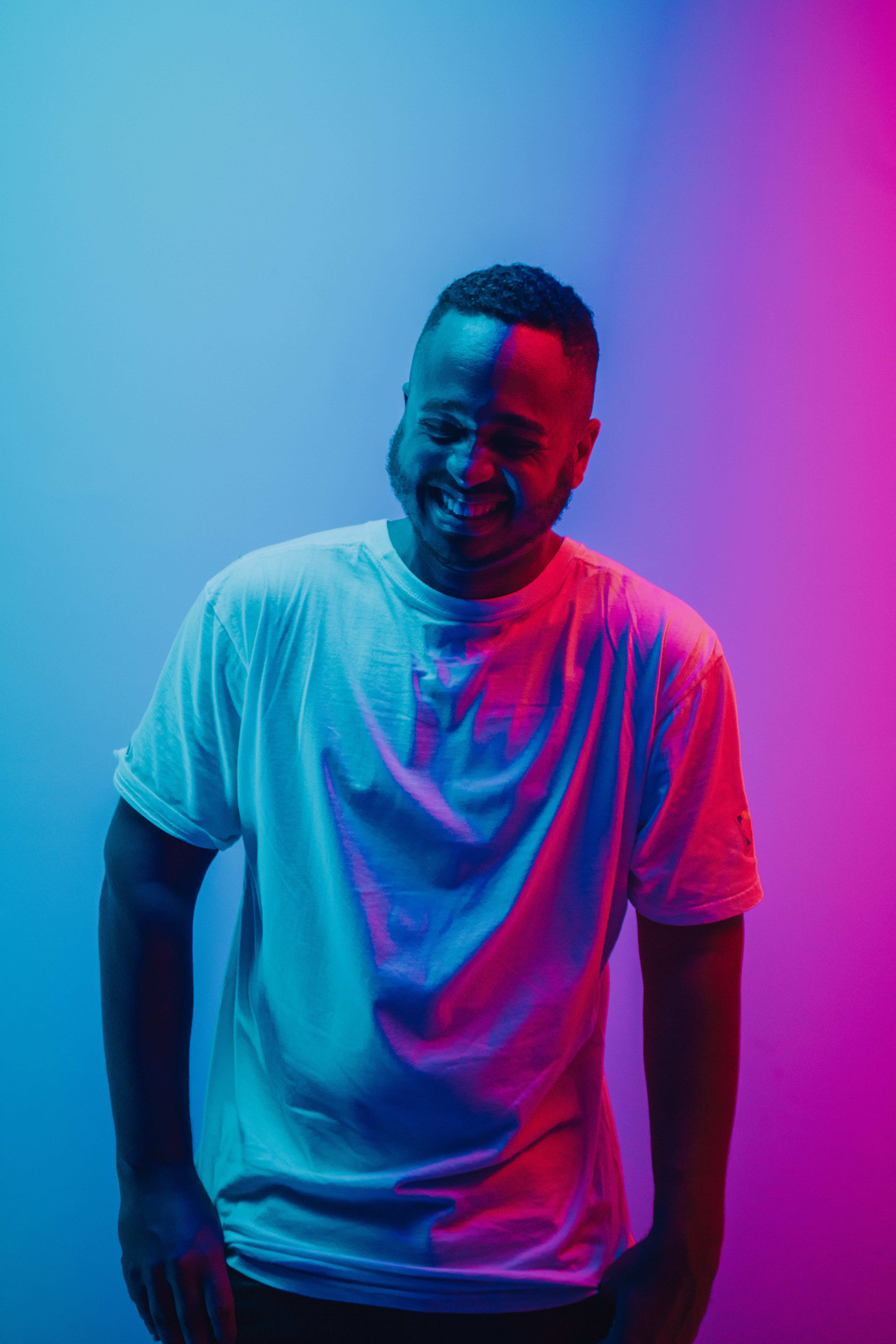 one Man Only, 5K, standing, colorful, light, wearing, people, young Adult, looking At Camera, one Person, shirt, smiling, dark, man, backgrounds, nigga, Phone HD Wallpaper