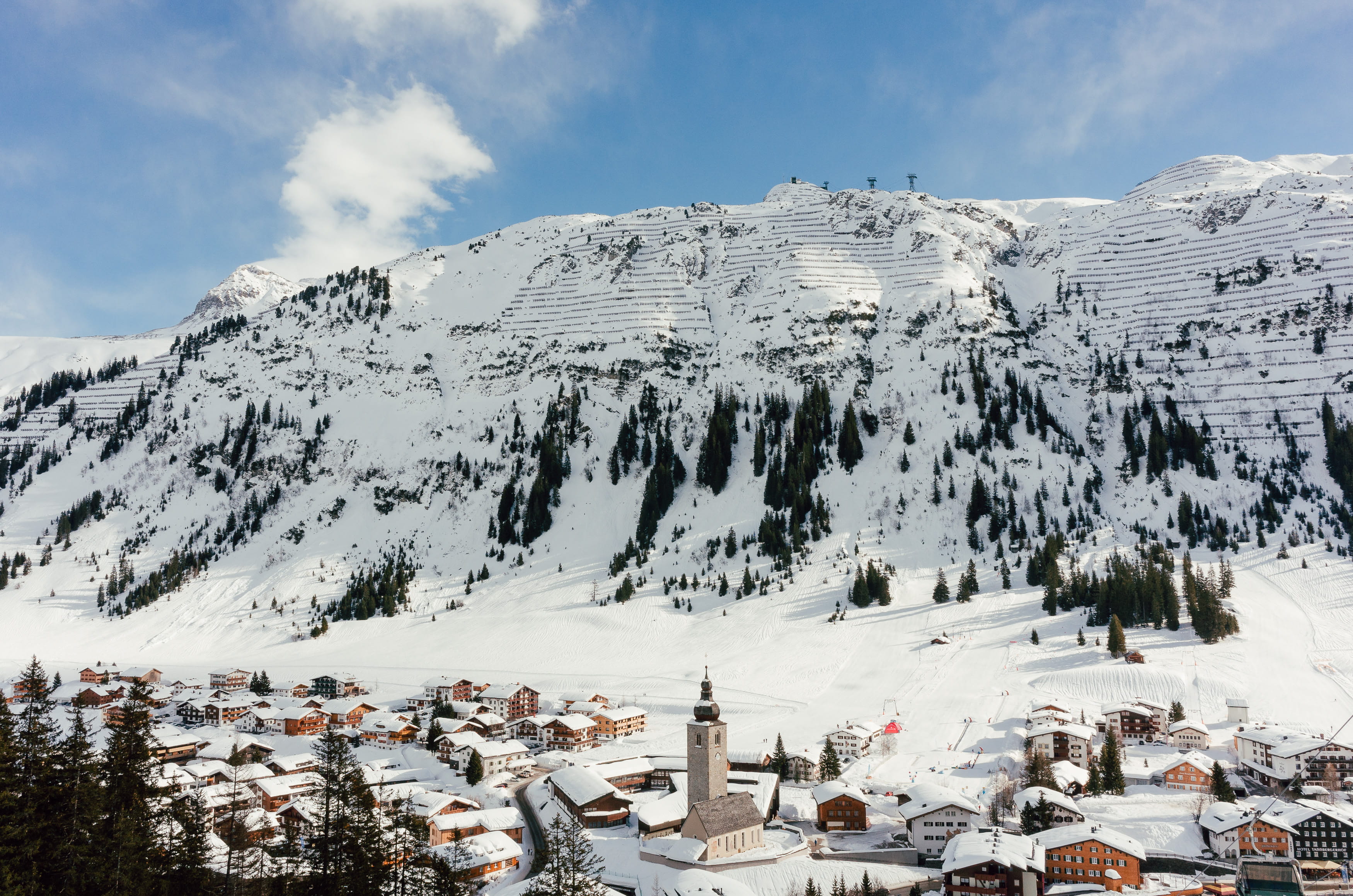 village, white, cold temperature, outdoors, tourism, sky, day, mountain, lech austria, scenery, skiing, mountains, winter season, building exterior, environment, HD Wallpaper