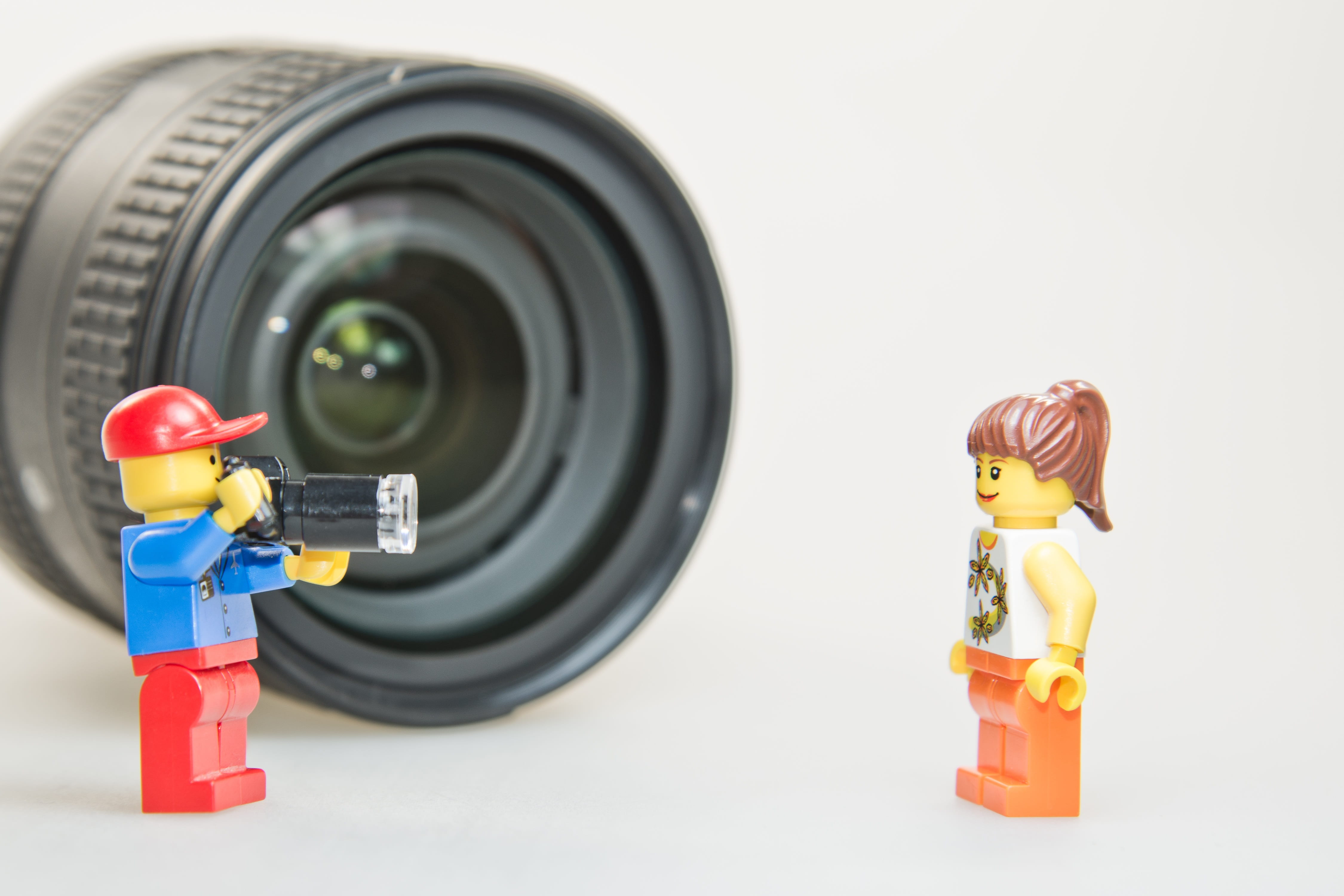 photographer, human representation, childhood, two, minifigures, female, accessories, robot, photo, male likeness, male, macro photography, creativity, HD Wallpaper