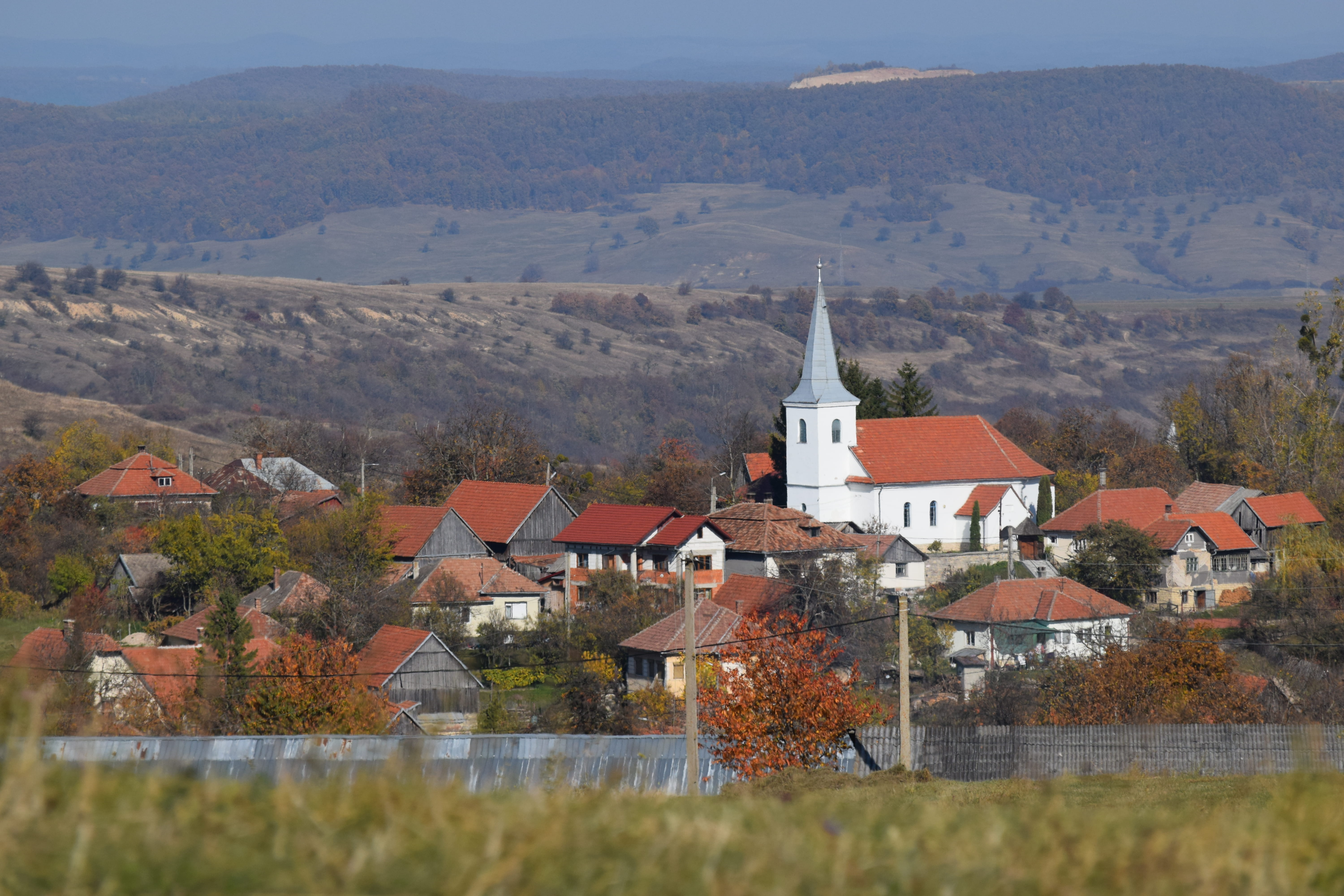 rooftops, no people, village, city, land, 5K, mountain, rooftop, hillside, landscape, fall, architecture, bushes, church, residential district, roof, windows, HD Wallpaper