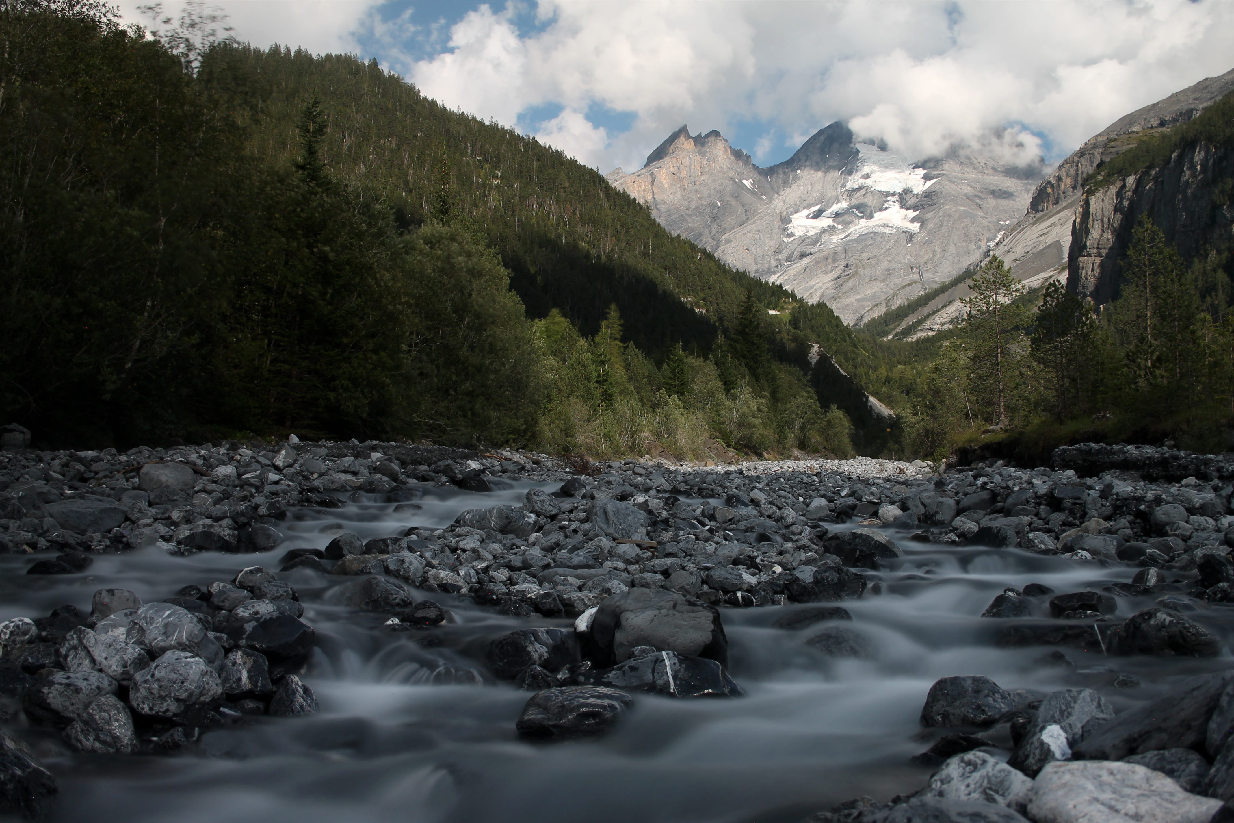 tranquility, riverbed, plant, stream - flowing water, summer, foggy water, day, mountain, snowcapped mountain, sky, flow, mountain range, nature, sun, river, HD Wallpaper