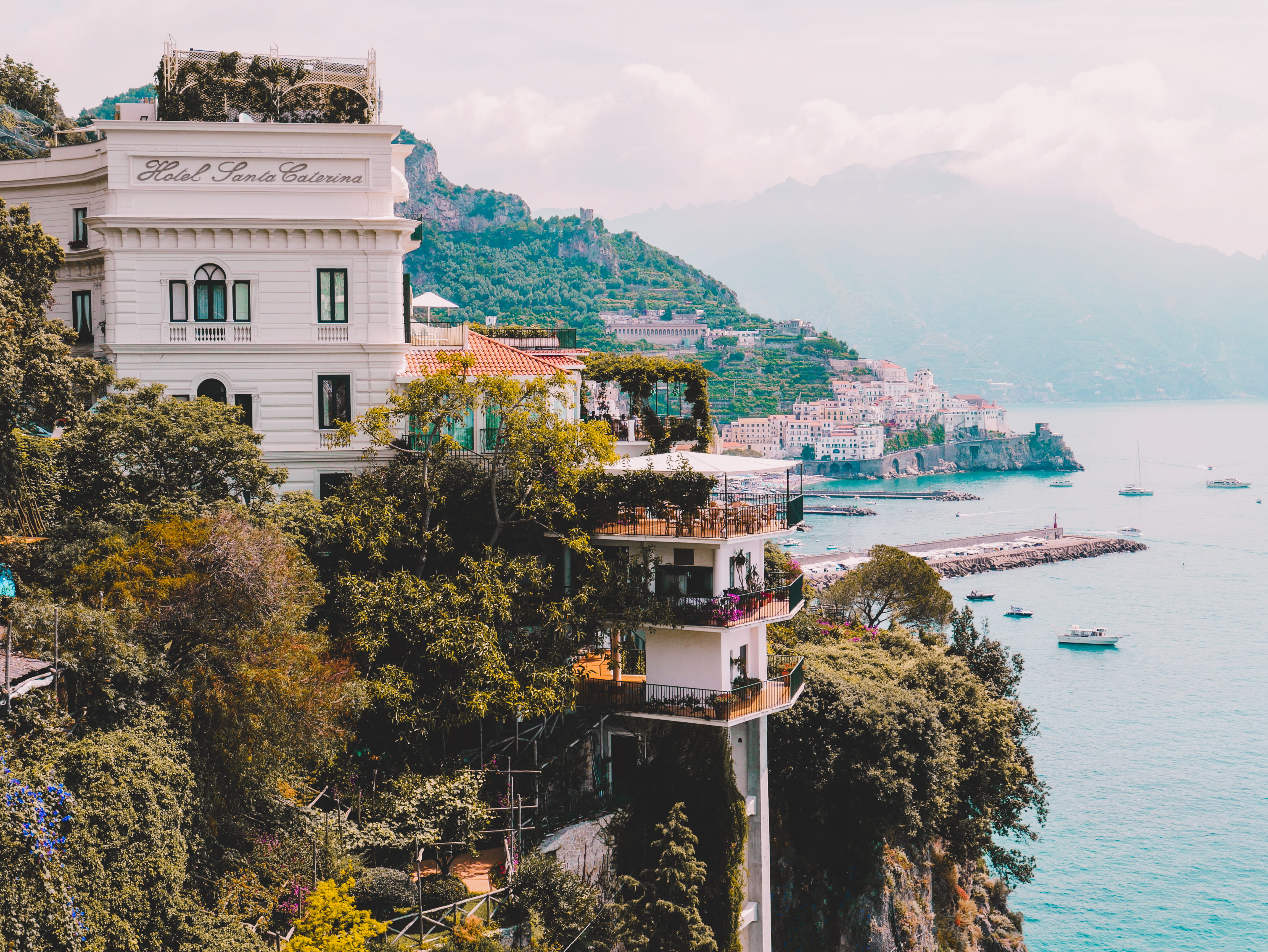 town, water, boats, santorini, mountain, sea, residential district, amalfi coast, building, dock, outdoors, cloud - sky, port, landscape, land, nature, HD Wallpaper