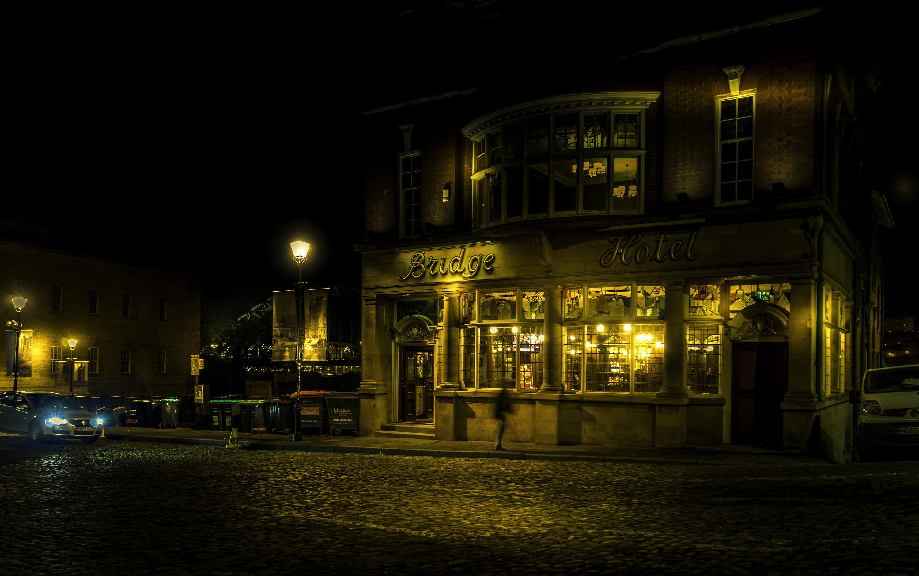 no people, headlights, communication, building exterior, western script, text, urban, yellow, lighting equipment, lamp posts, street light, night, signage, HD Wallpaper