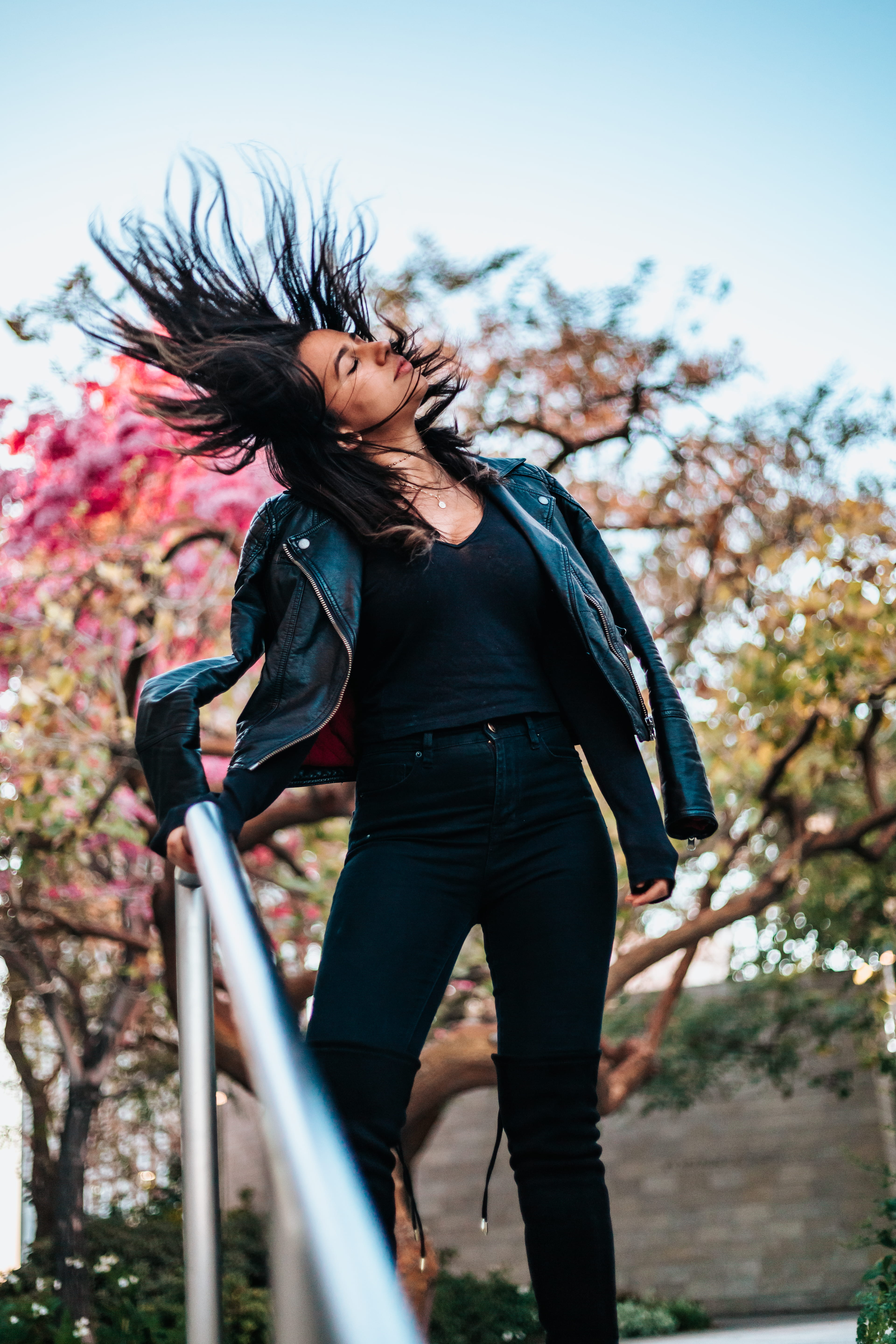flipping, outdoors, blossom, leisure activity, hair, one person, young women, full length, low angle view, 5K, adult, young adult, lifestyles, portrait, Phone HD Wallpaper