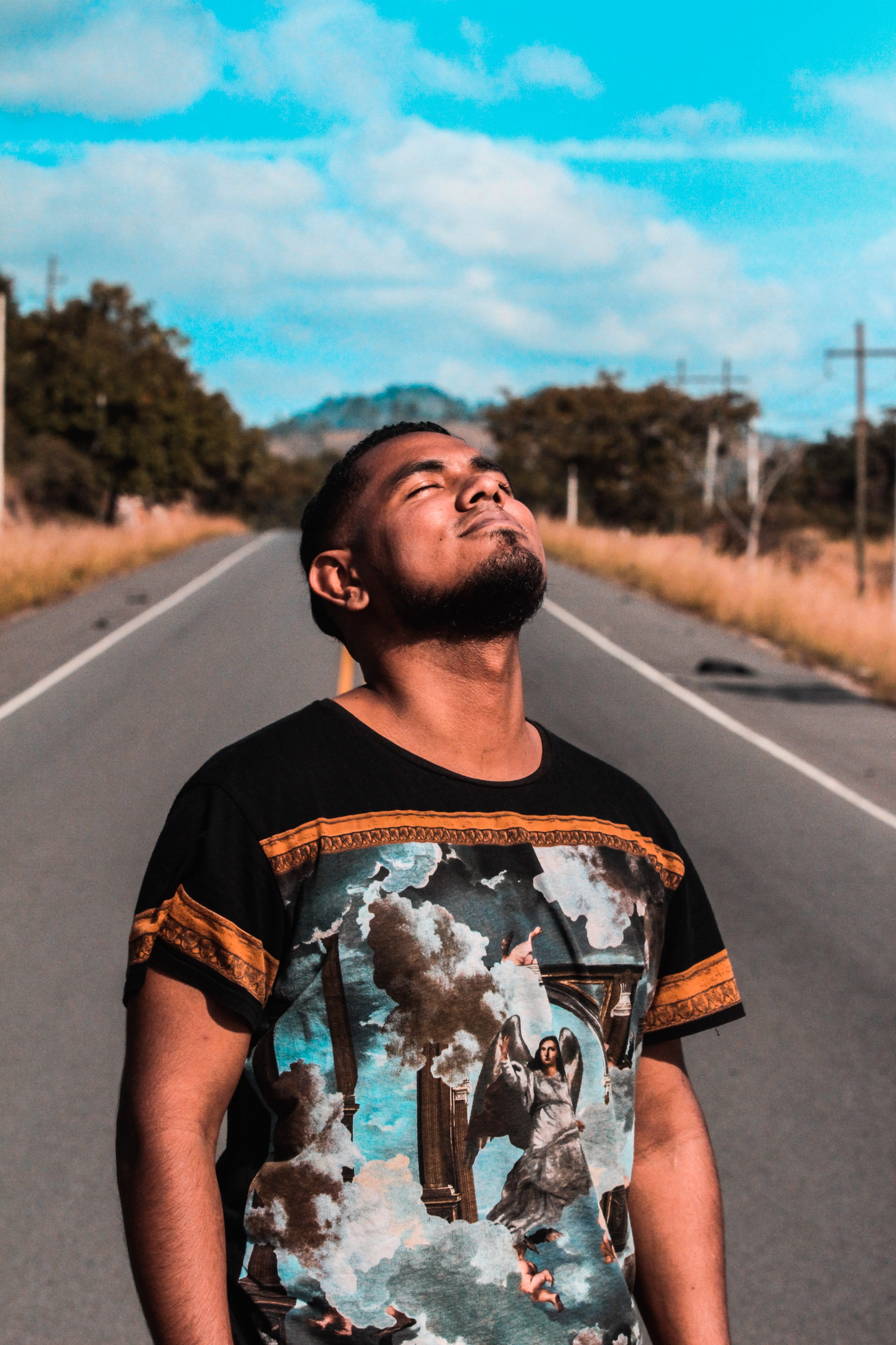 standing, talent, honduras, clothing, focus on foreground, young adult, lifestyles, front view, people, nature, road, waist up, real people, young men, Phone HD Wallpaper