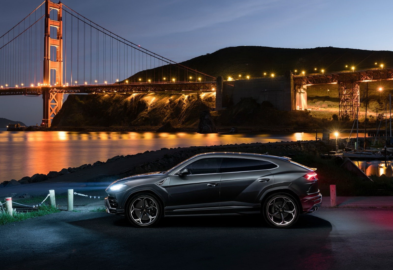 bridge, architecture, city, 720P, transportation, connection, sky, water, suspension bridge, nature, motor vehicle, reflection, night, urus, illuminated, HD Wallpaper