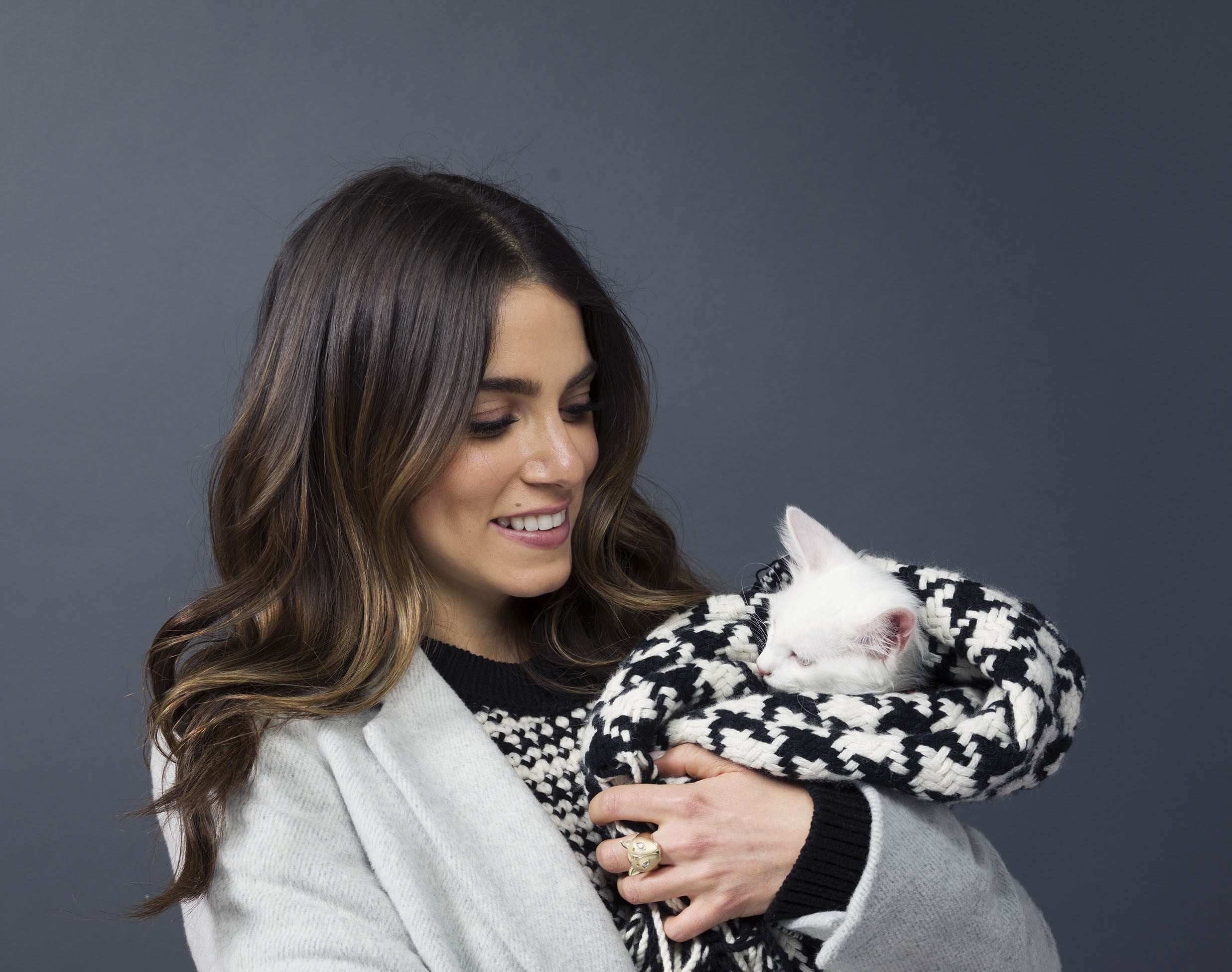 holding, Nikki Reed, young adult, portrait, pet owner, cat, long hair, sweater, indoors, black background, one person, brunette, domestic animals, pets, HD Wallpaper
