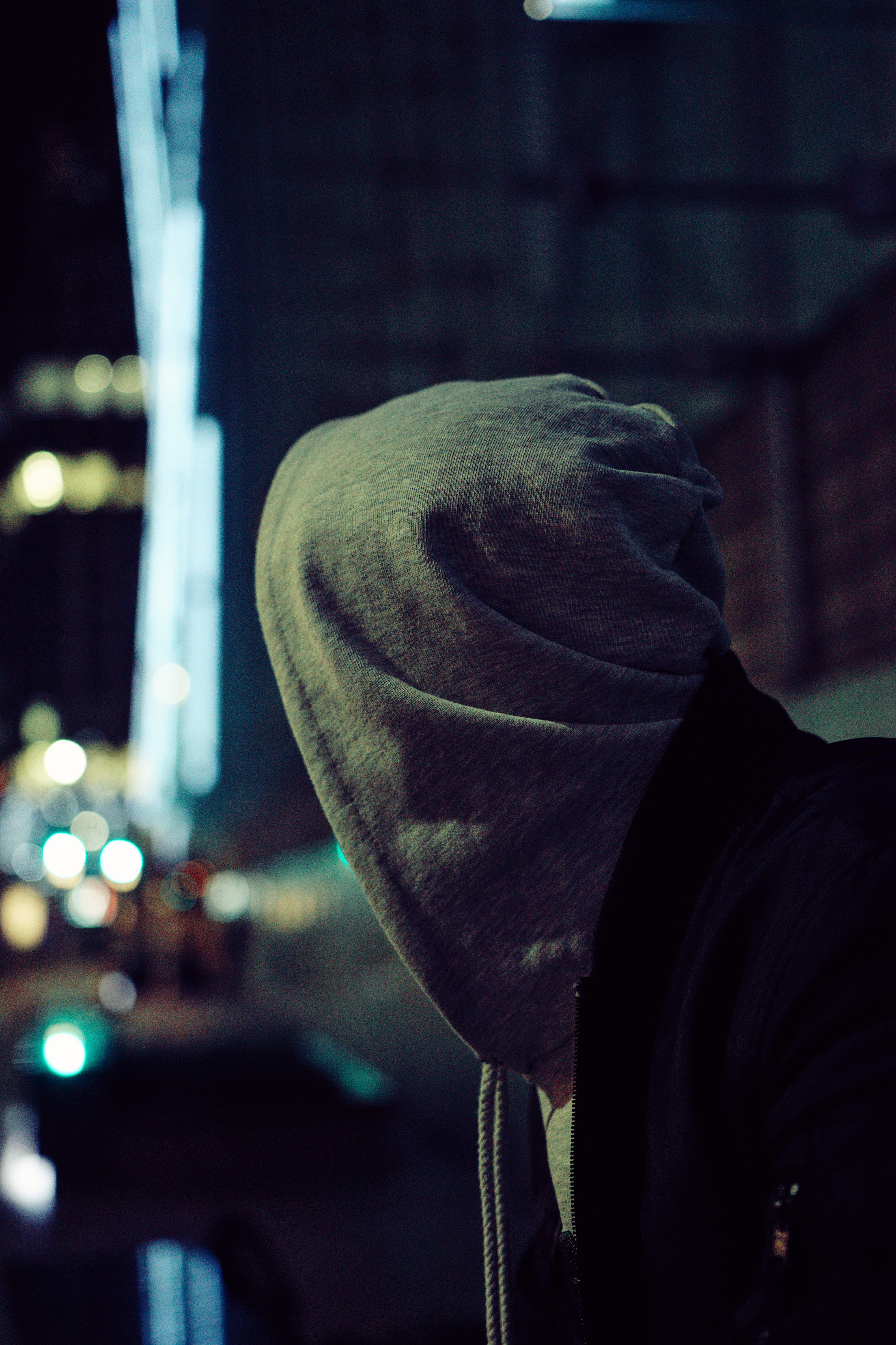 hood - clothing, one person, street, clothing, obscured face, real people, unrecognizable person, hat, lifestyles, aesthetic, light, outdoors, bokeh, focus on foreground, Phone HD Wallpaper