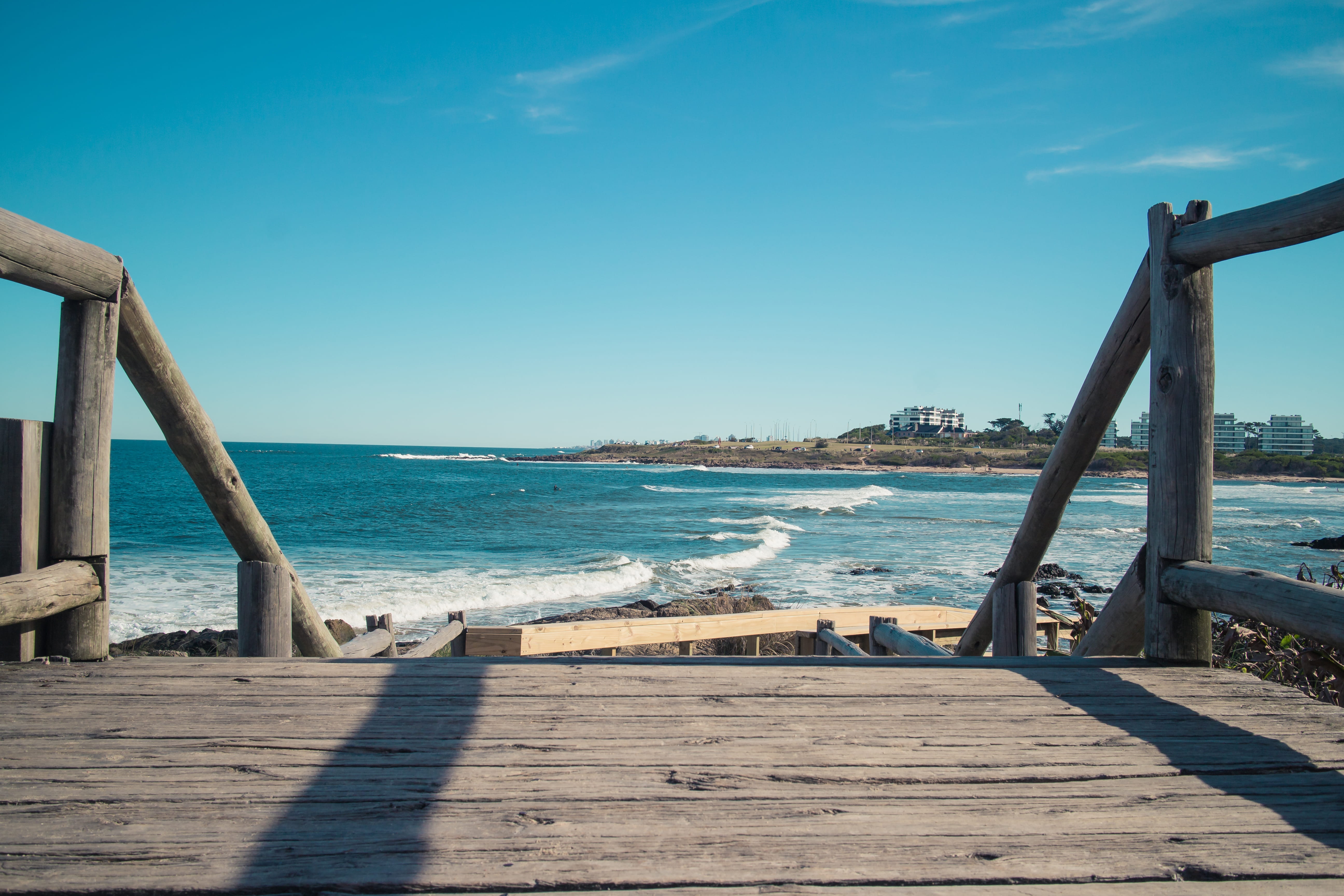 wooden post, sky, pier, horizon over water, boardwalk, beauty in nature, land, day, tranquility, scenics - nature, uruguay, sunlight, shadow, tranquil scene, HD Wallpaper