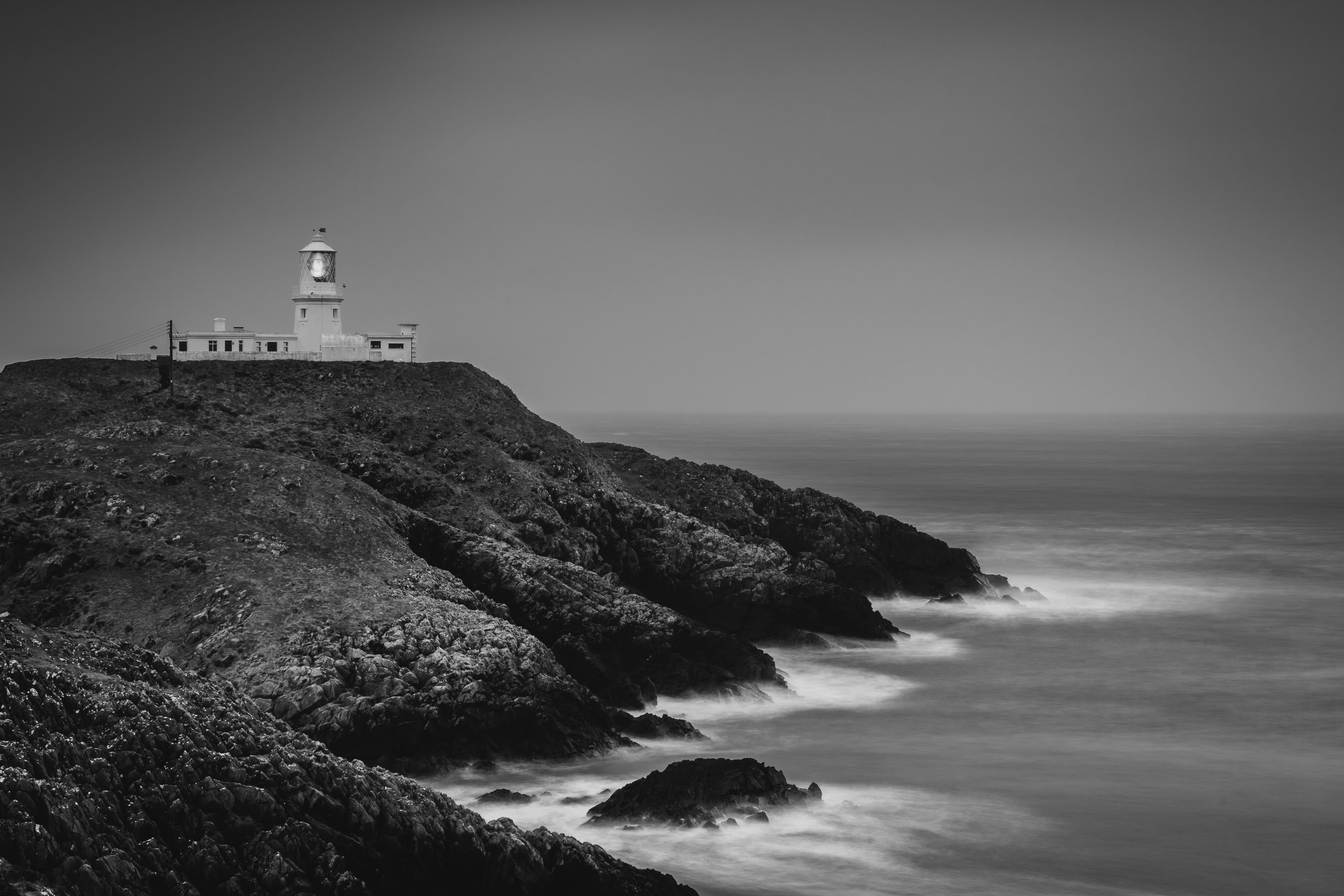 explore, horizon over water, rocks, land, overcast, outdoors, sky, wales, pembrokeshire, monochrome, no people, 5K, coast, built structure, beauty in nature, HD Wallpaper