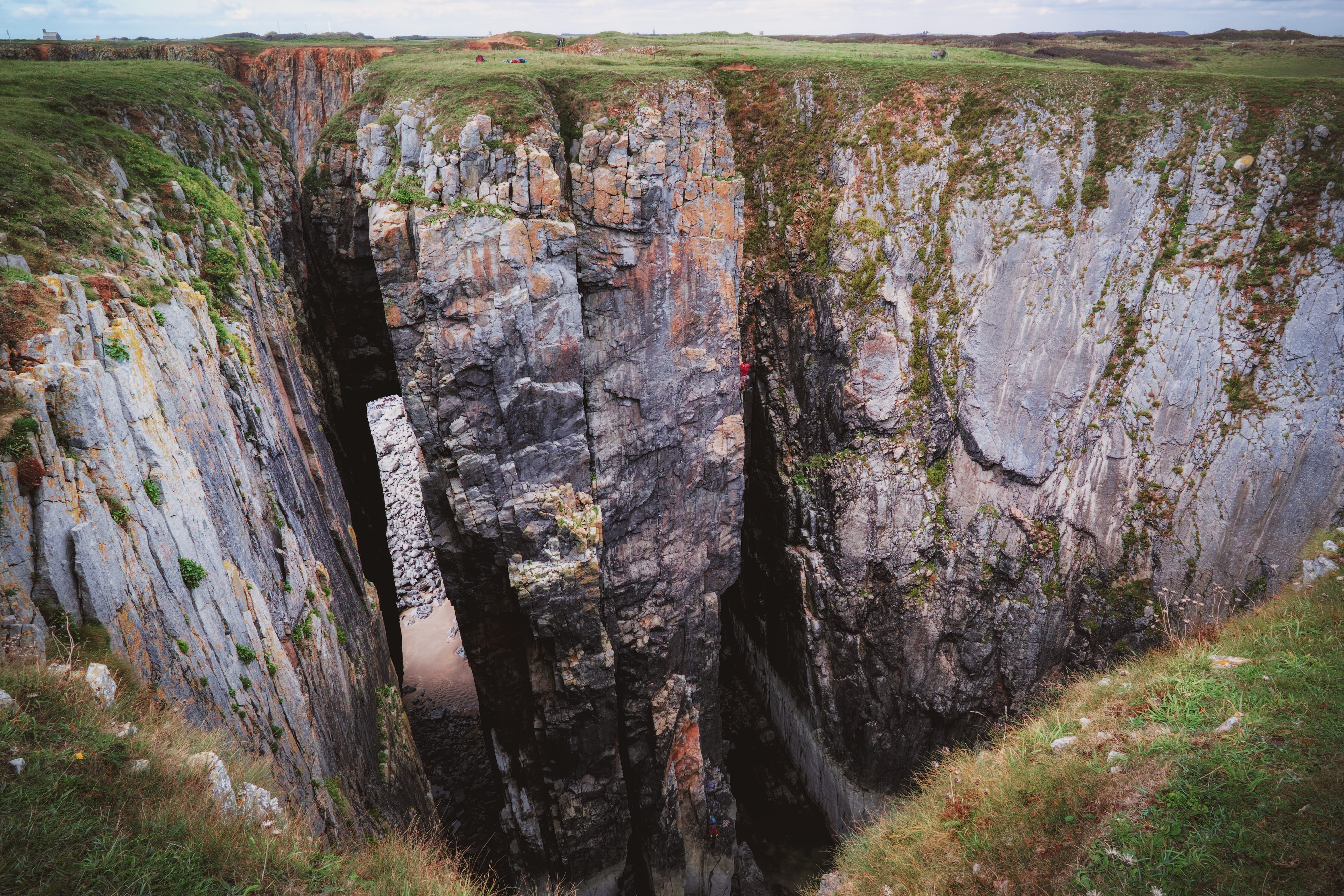 gray, day, 5K, the cauldron, land, cauldron, flimston, seascape, pembrokeshire, south wales, formations, no people, autumn, chasm, wales, climber, beauty in nature, HD Wallpaper