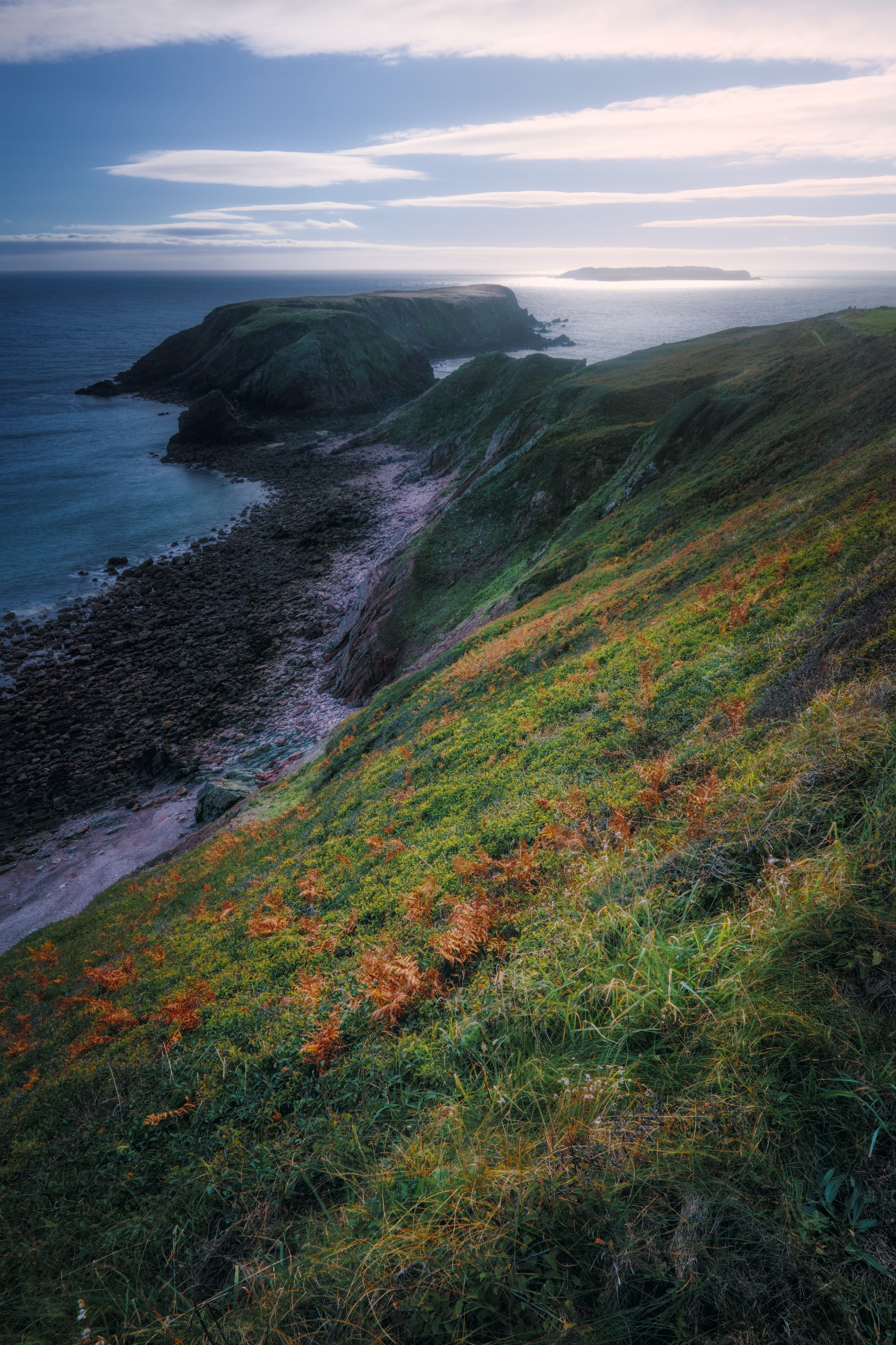 tranquil scene, sky, islands, nature, cliff, outdoors, ocean, sunset, green, daytime, near, growth, plant, promontory, land, pembrokeshire, beach, marloes, Phone HD Wallpaper