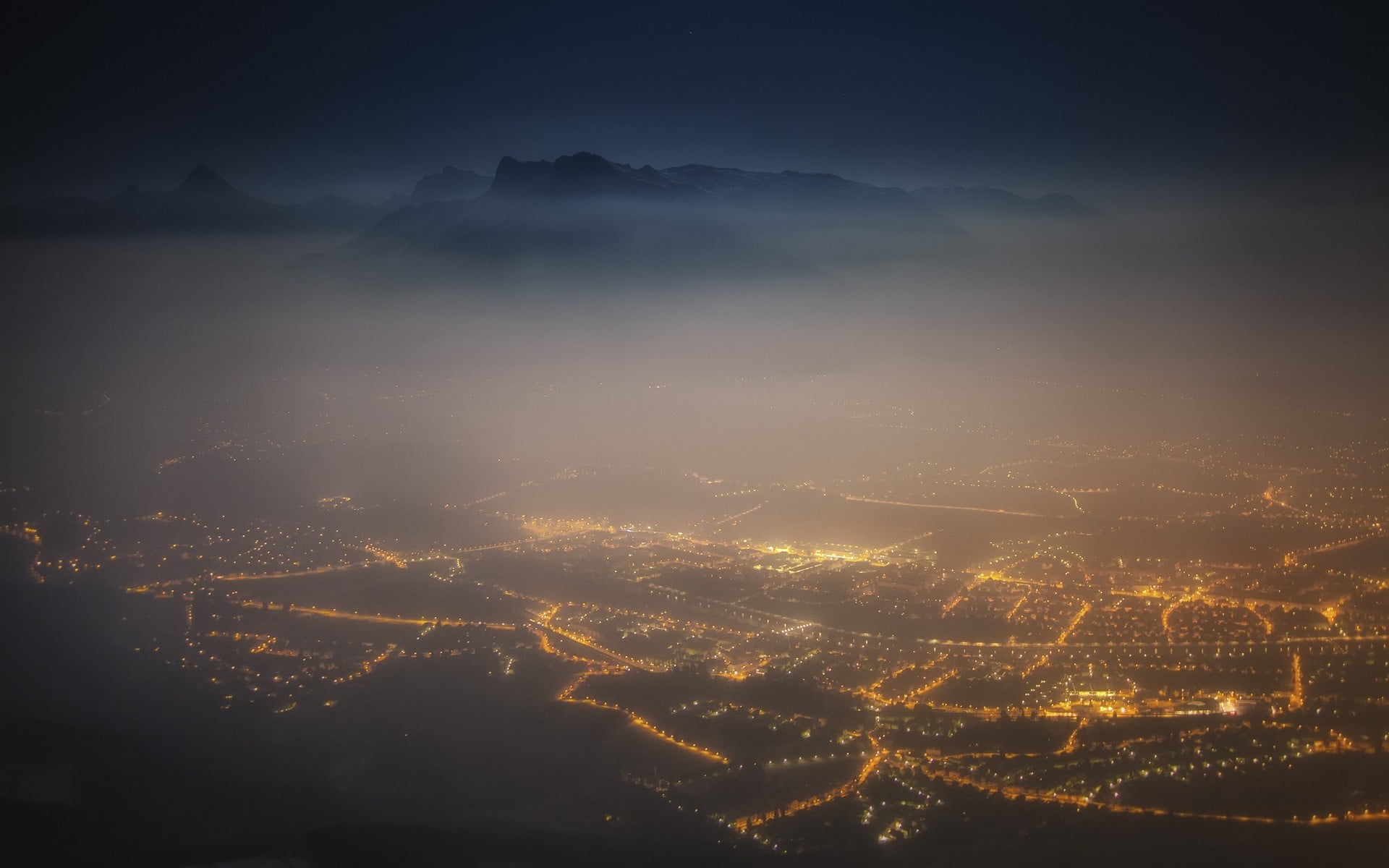 fog, building exterior, landscape, aerial view, no people, Salzburg, mountains, mountain range, Austria, cloud - sky, lights, cityscape, mist, yellow, architecture, HD Wallpaper