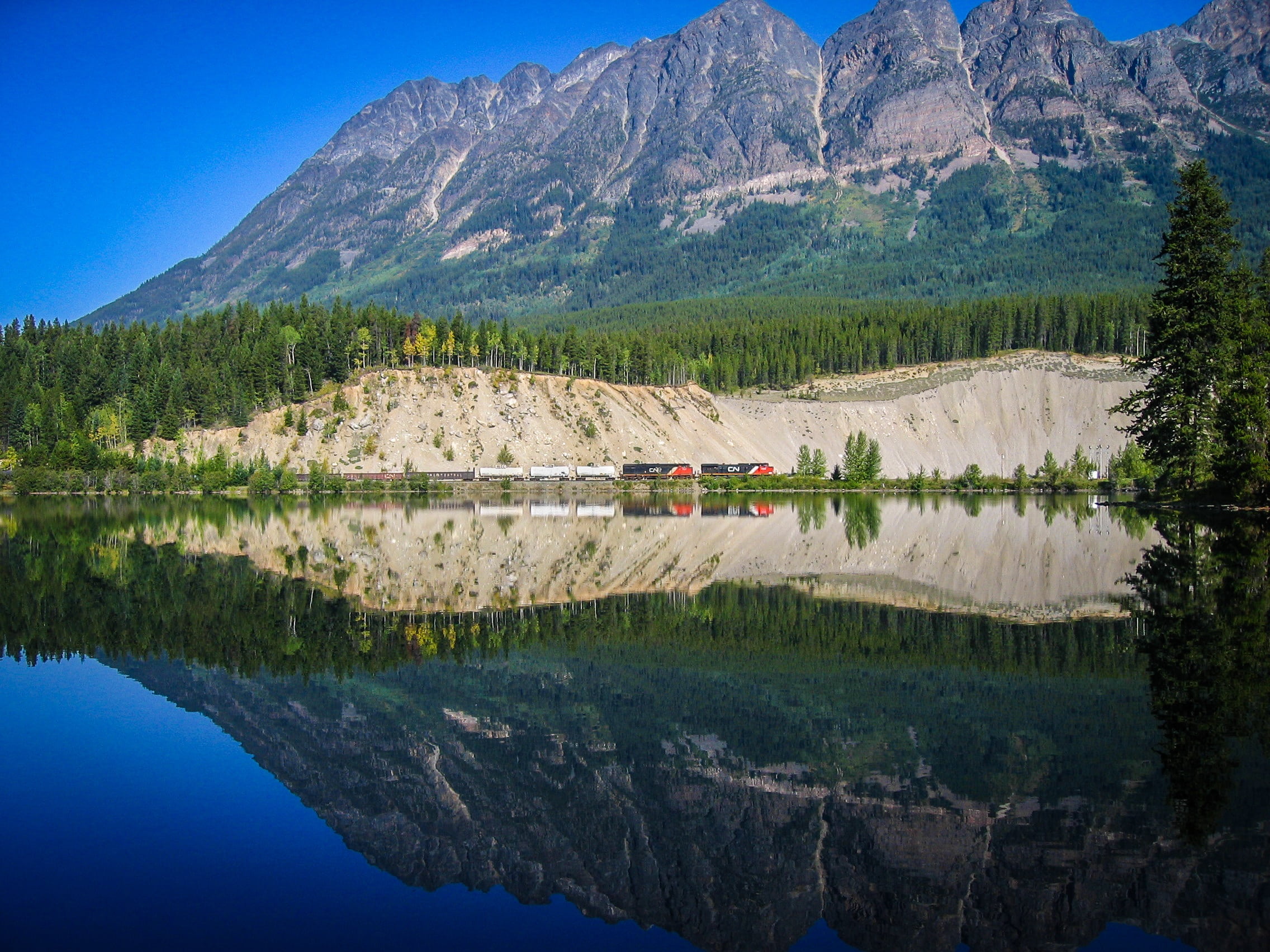 beauty in nature, reflection, day, outdoors, land, railway, environment, mountain peak, nature, mirroring, plant, tranquility, canada, tranquil scene, no people, HD Wallpaper