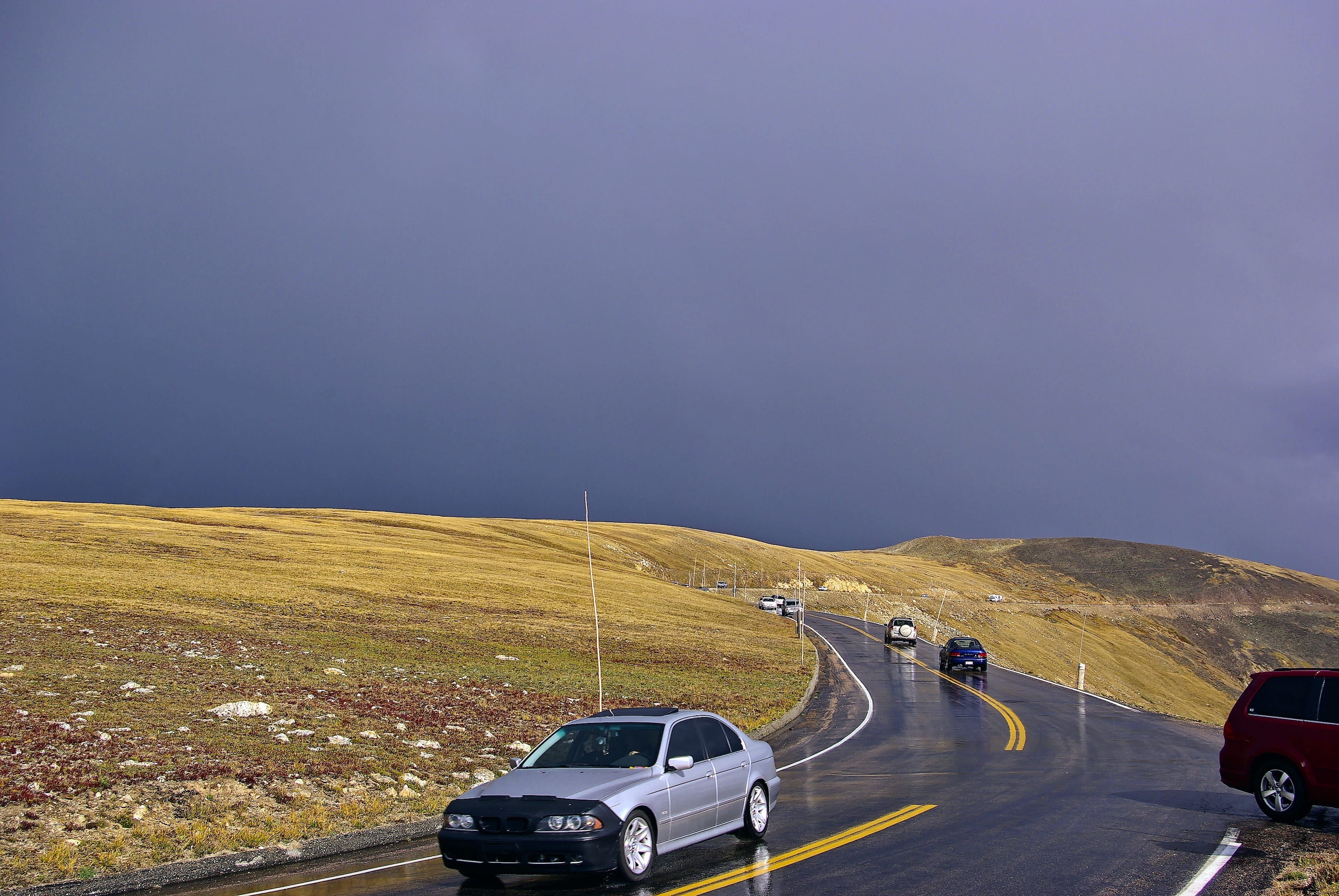 road trip, ridge, mountain, car, dark, motion, marking, no people, scenic, rocky, national, nature, sky, travel, direction, multiple lane highway, 2K, HD Wallpaper