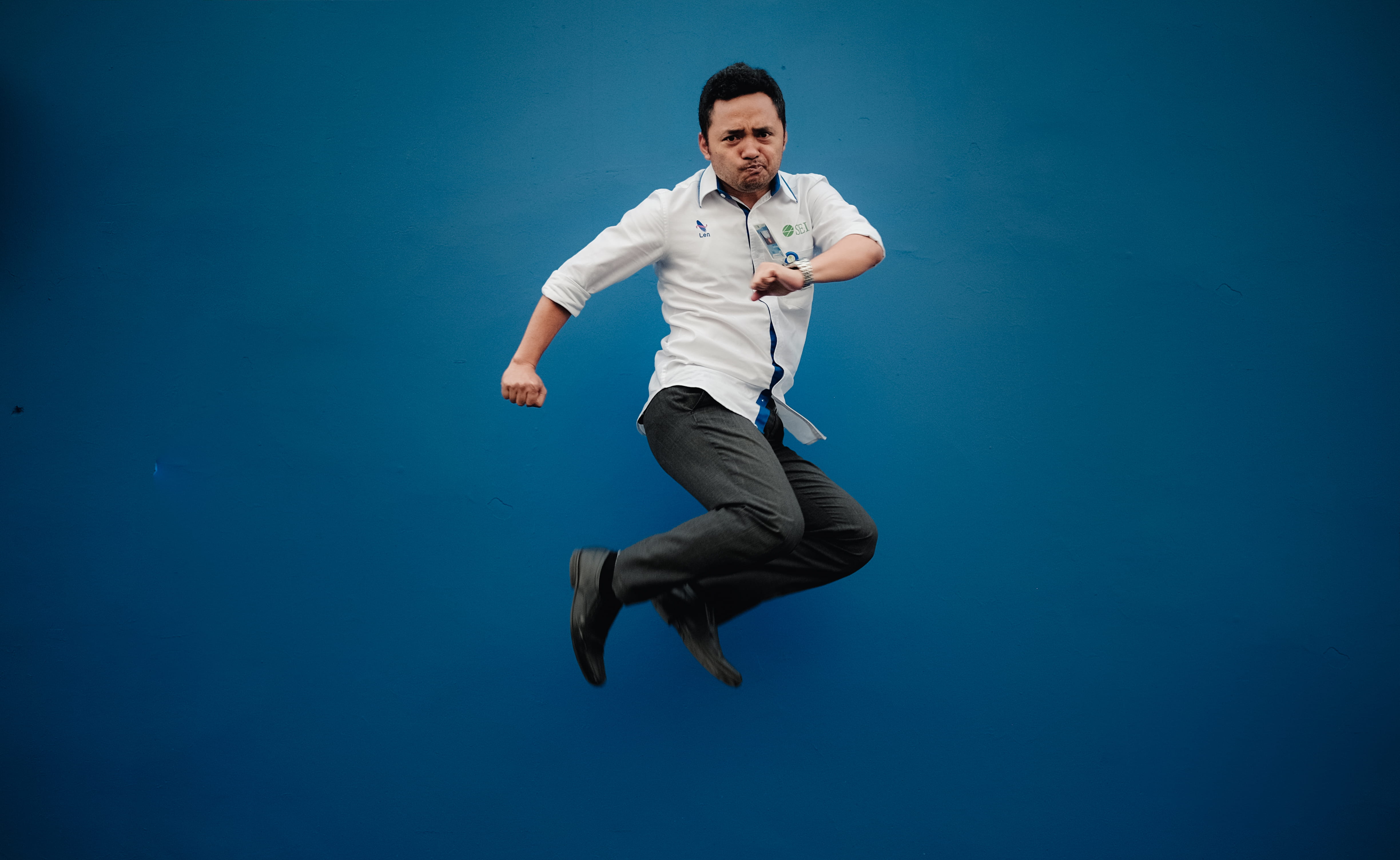 people, white shirt, colored background, men, business, pt len industri (persero), business person, one person, portrait, young adult, happy man, blue, HD Wallpaper