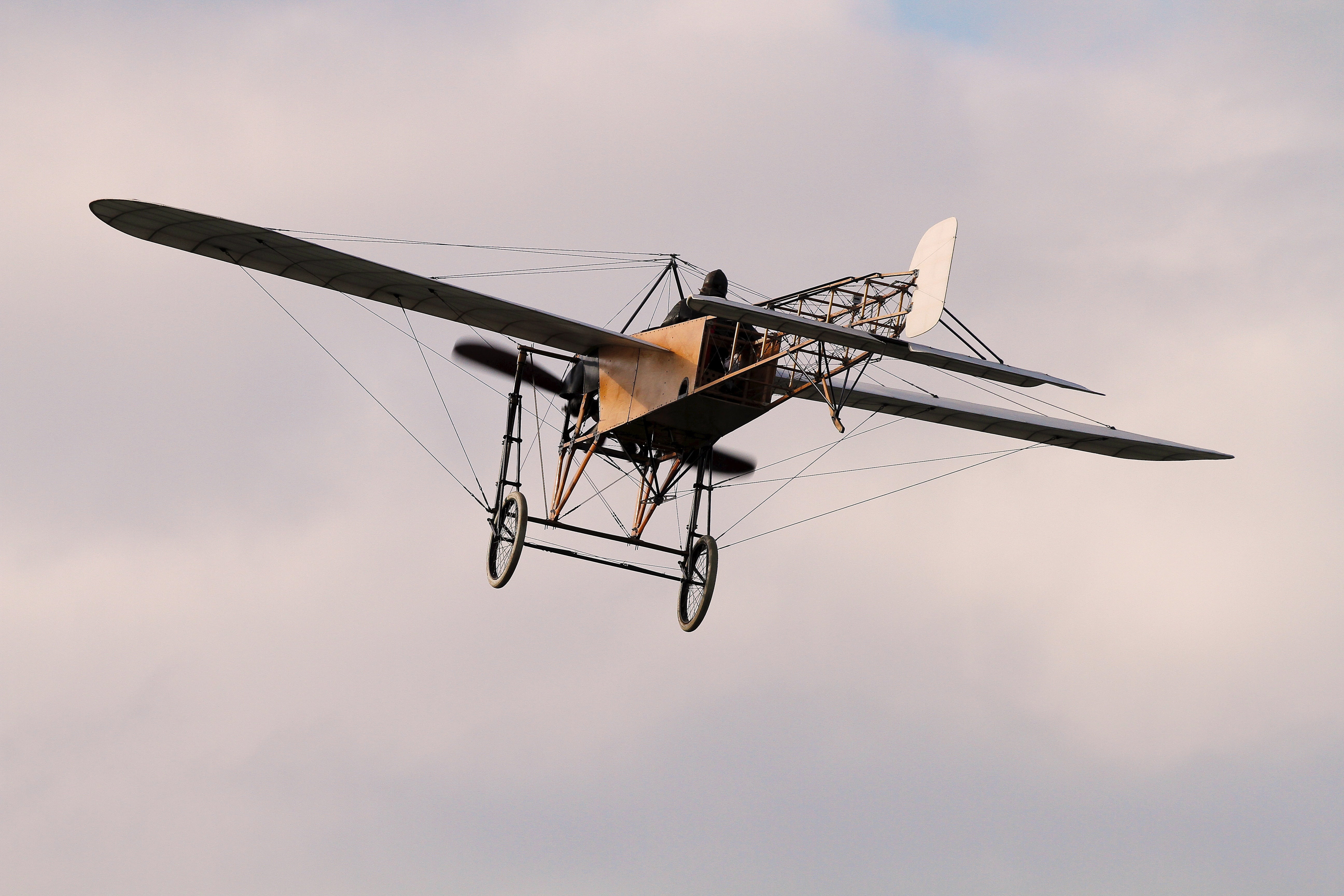 flight, brown, white, military, retro, propeller, 5K, no people, aerospace industry, day, monoplane, sky, outdoors, on the move, cloud - sky, mid-air, HD Wallpaper