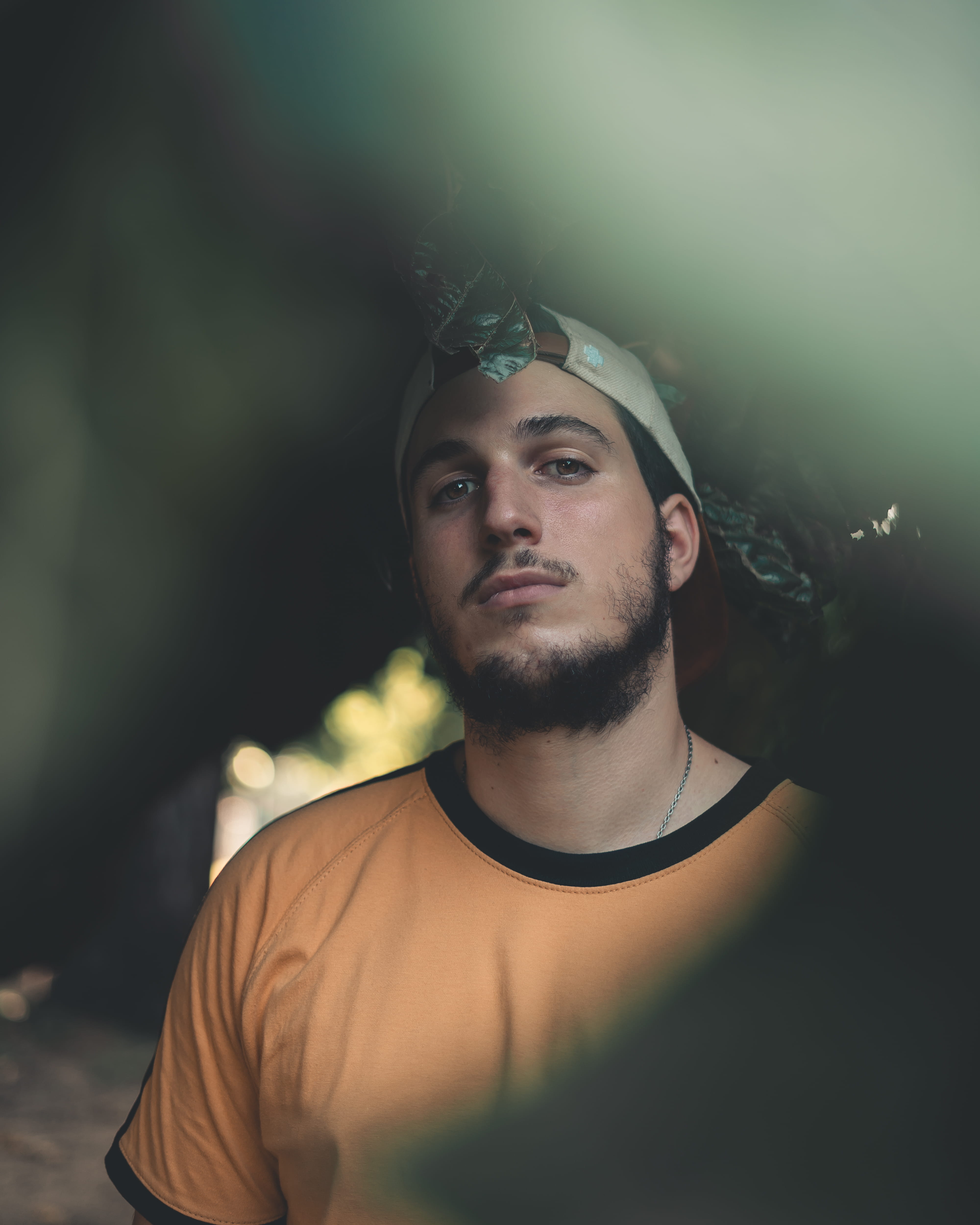 t, serious, front view, streetwear, waist up, young adult, contemplation, man, hat, standing, real people, beard, young men, portrait, 4K, selective focus, Phone HD Wallpaper