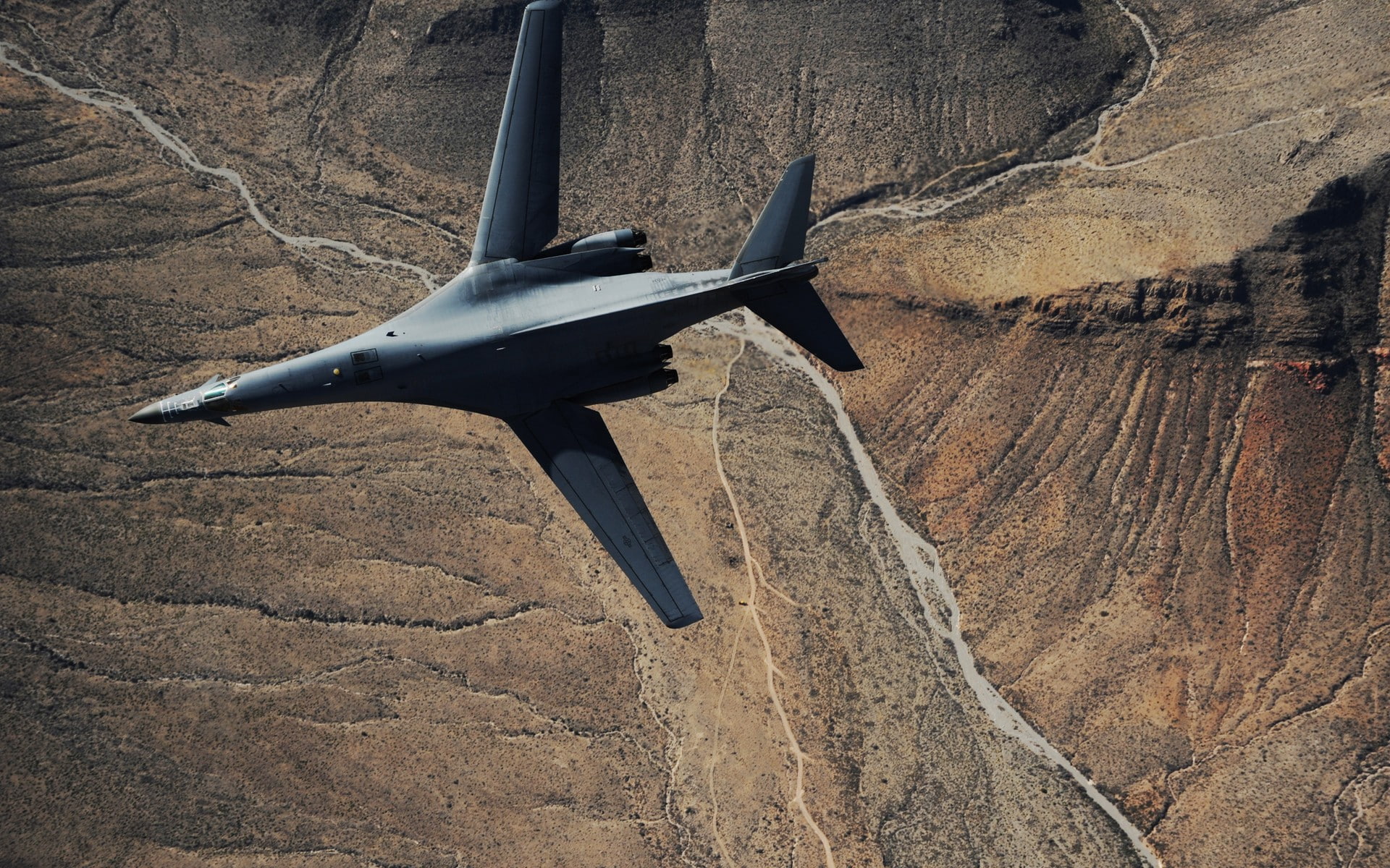 low angle view, army, outdoors, air vehicle, nature, plane, transportation, aerospace industry, mid-air, rock formation, Rockwell B-1 Lancer, 1080P, mountain, HD Wallpaper