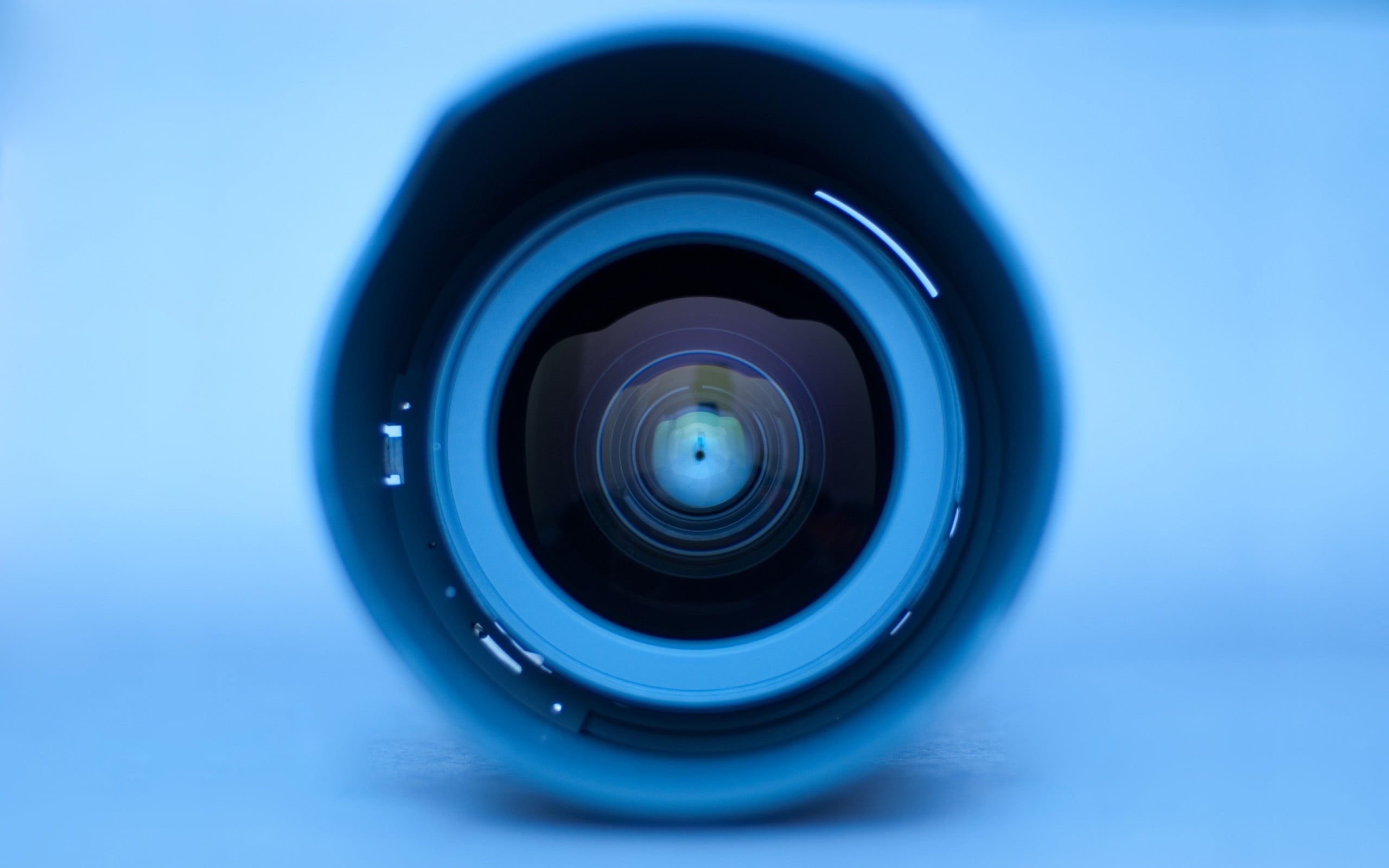 minimalism, circle, blue background, eyes, camera, equipment, photography Themes, lens, no People, technology, single Object, studio Shot, home Video Camera, HD Wallpaper
