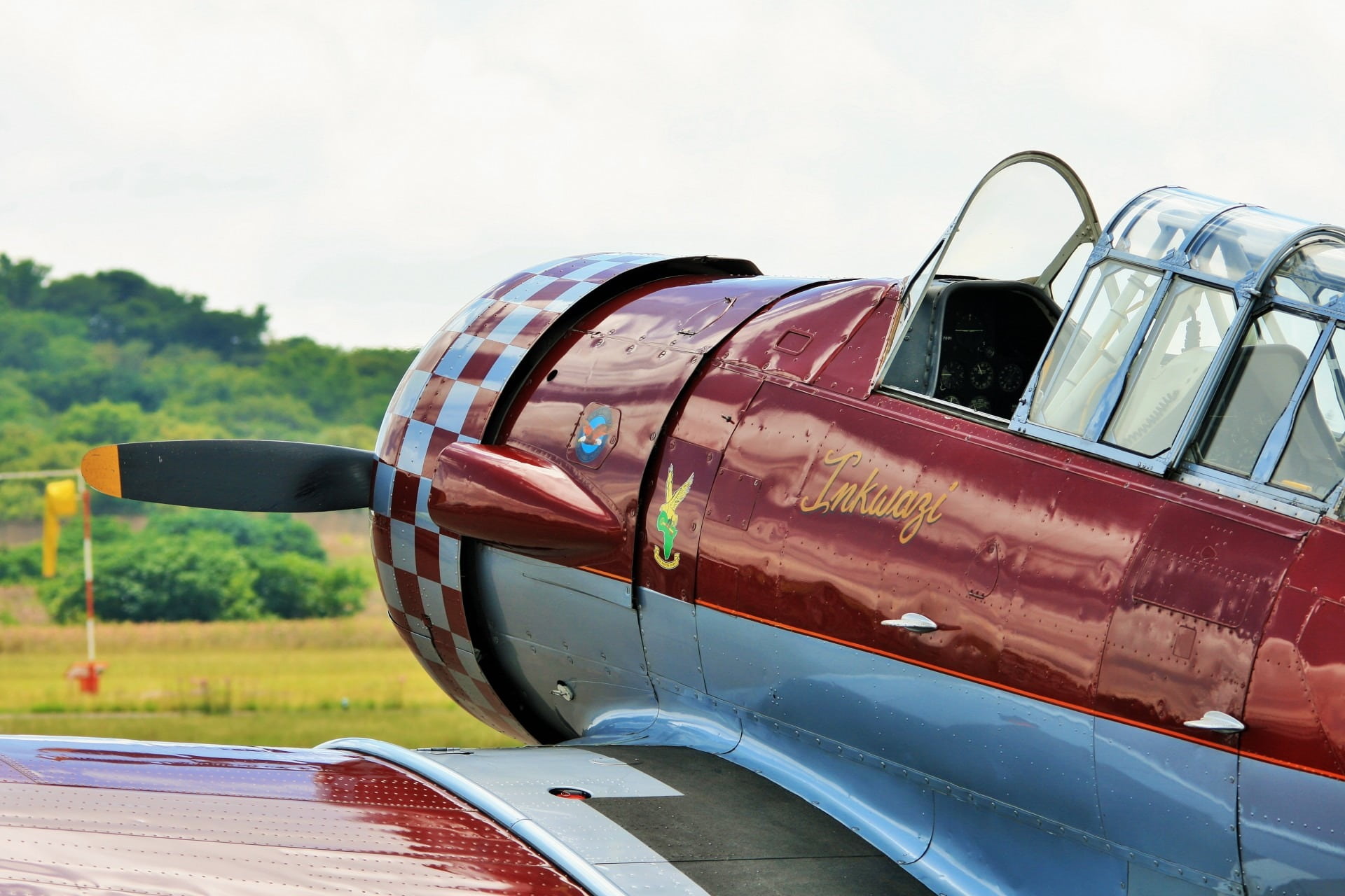 inkwazi, land, metal maroon, airplane, trainer, retro Styled, day, at-6, transportation, window, red, car, aircraft, fixed wing, flying, outdoors, land vehicle, HD Wallpaper
