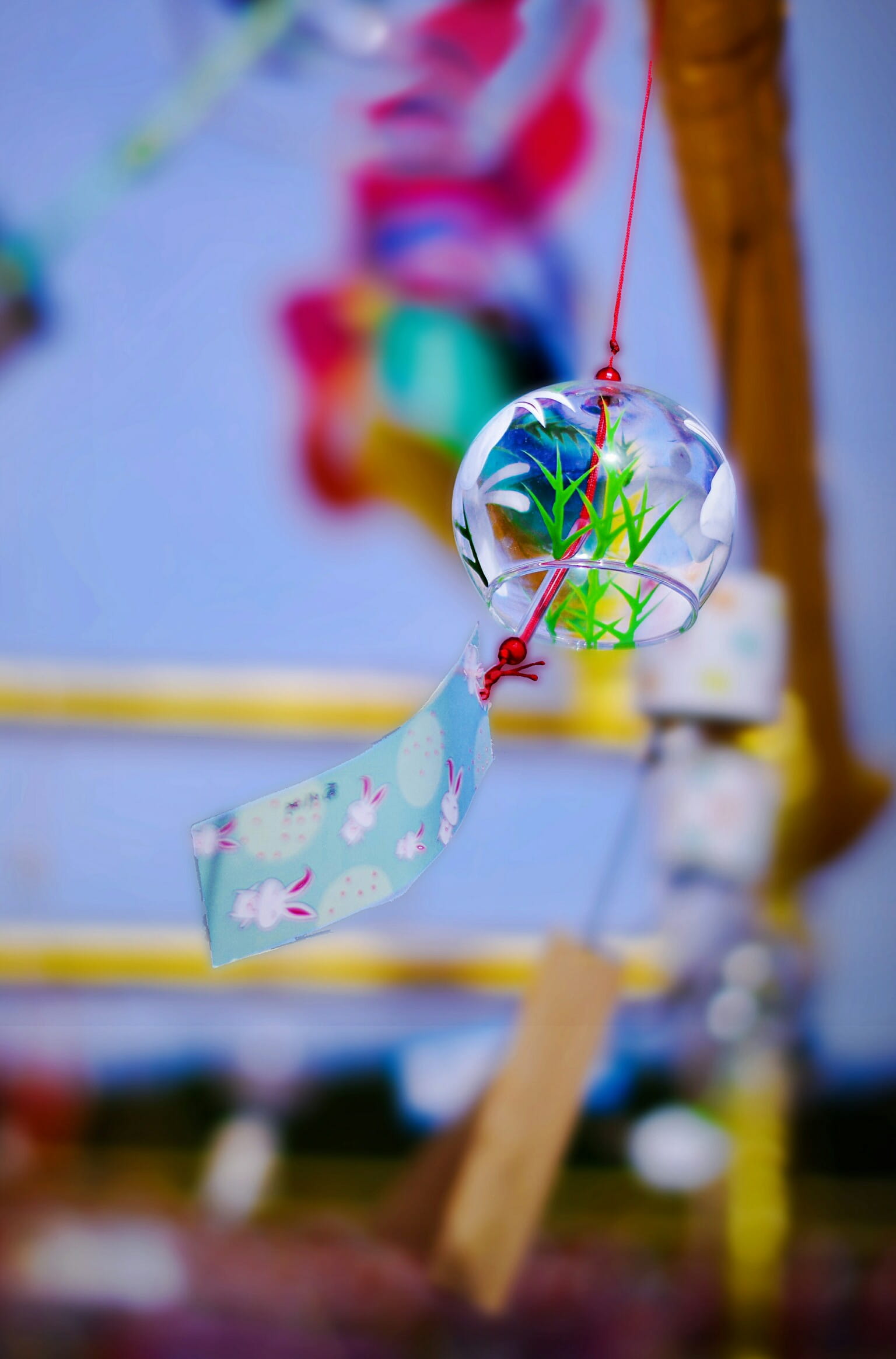selective focus, focus on foreground, day, representation, celebration, hanging, toy, nature, bell, art and craft, no people, creativity, outdoors, streamer, Phone HD Wallpaper