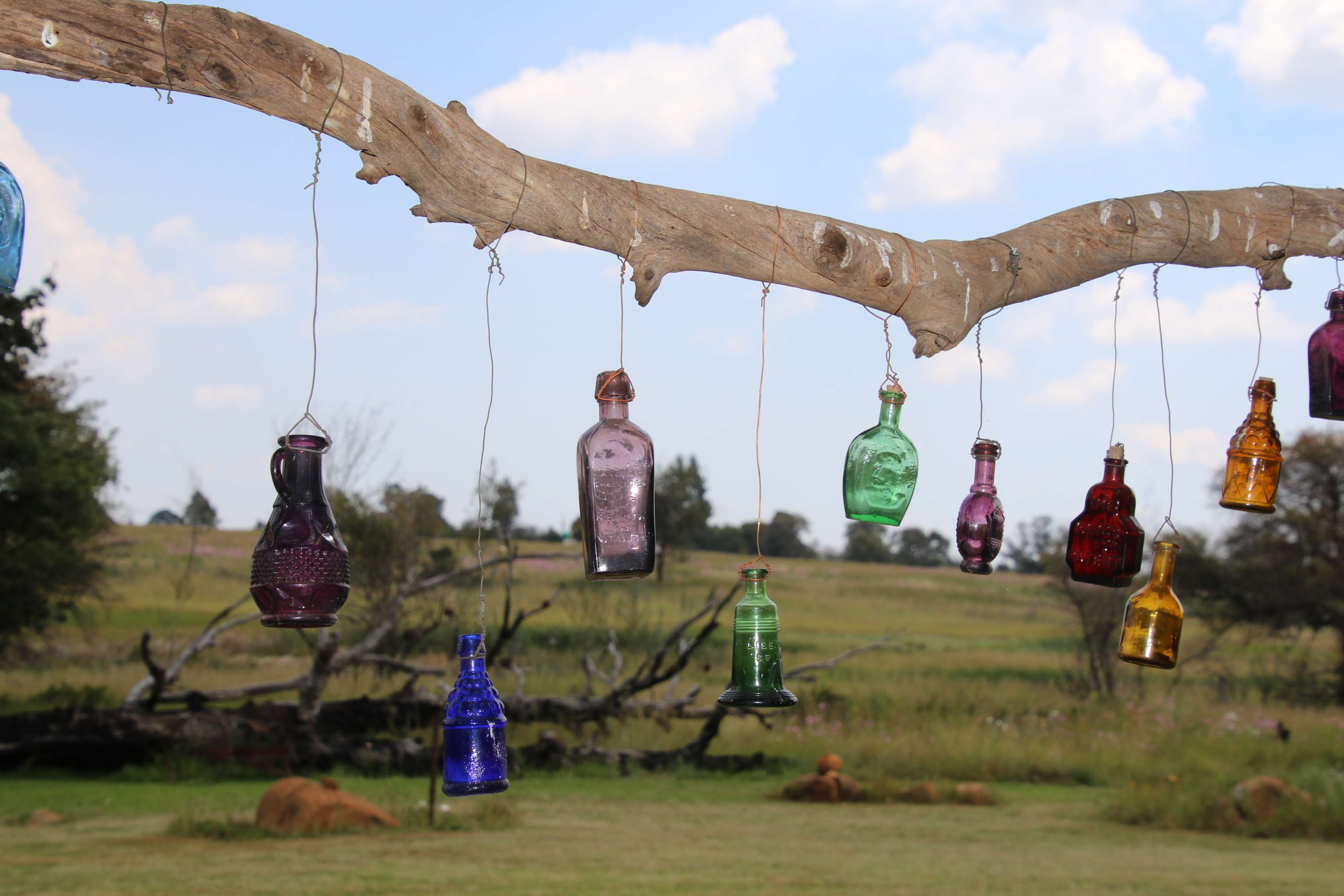 wind chime, cloud - sky, art, metal, colorful glass, art ideas, no people, bell, day, colorful, field, tree, nature, landscape, hanging, rustic, clouds, HD Wallpaper