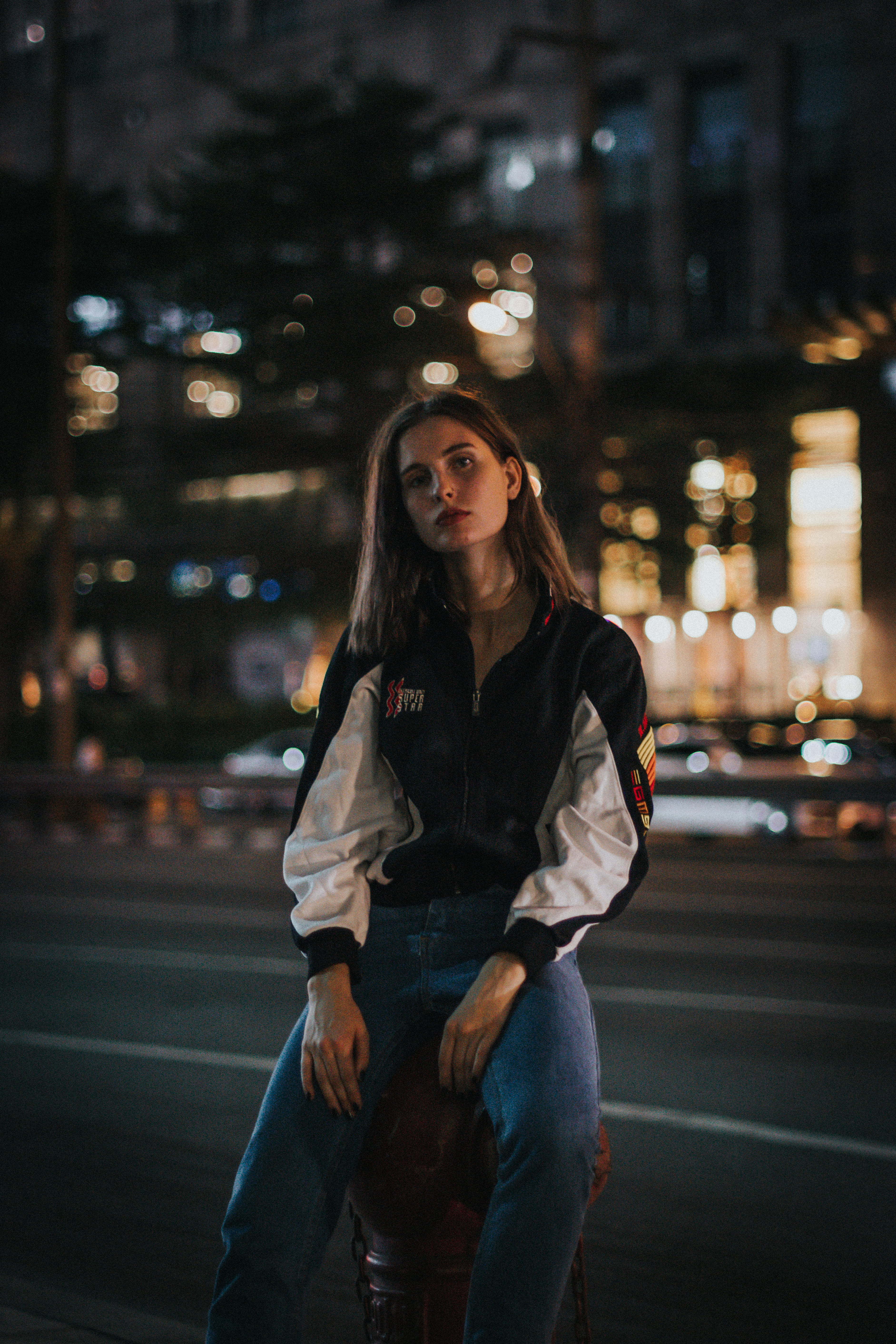 architecture, human, retro, pose, person, lifestyles, sat, leather jacket, focus on foreground, female, real people, jacket, moody, portrait, fashion, young women, Phone HD Wallpaper