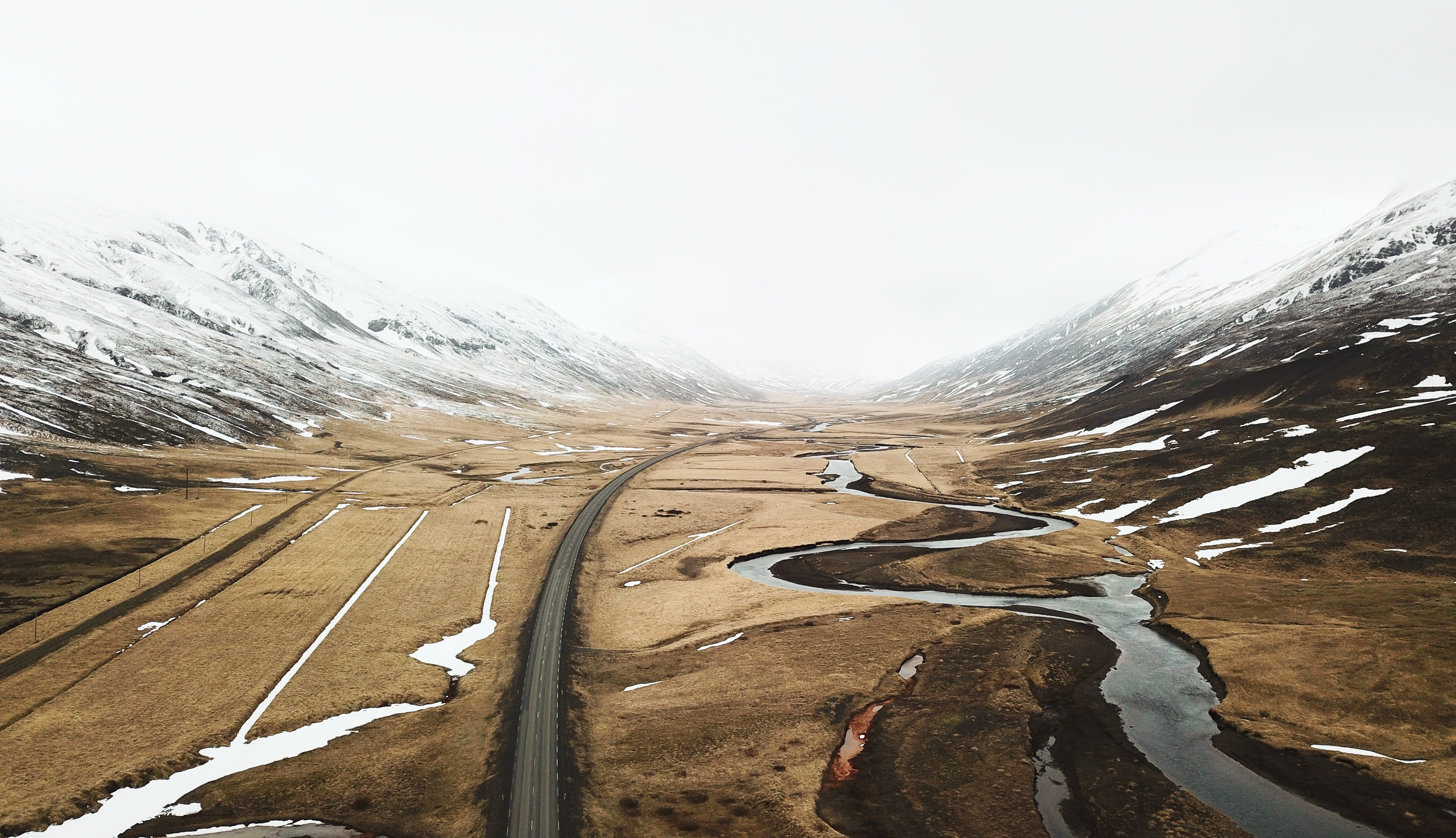 photo, 4K, towards, winding road, environment, vast, mountain range, road, landscape, aerial, no people, tranquility, nature, akureyri, outdoors, non-urban scene, HD Wallpaper