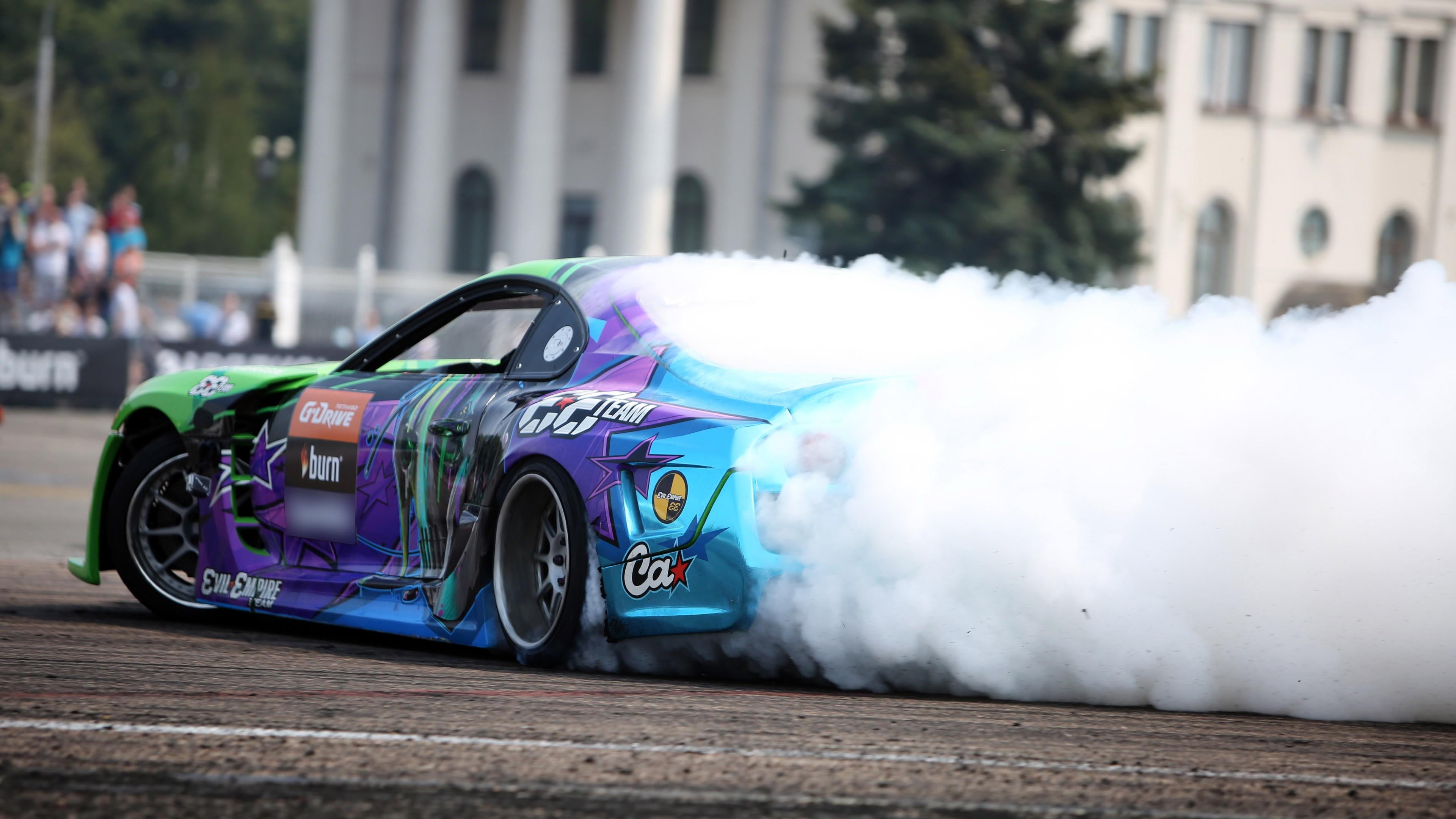 sport, outdoors, built structure, asphalt, race car, smoke, street, day, transportation, automotive design, sports car, incidental people, motor vehicle, HD Wallpaper