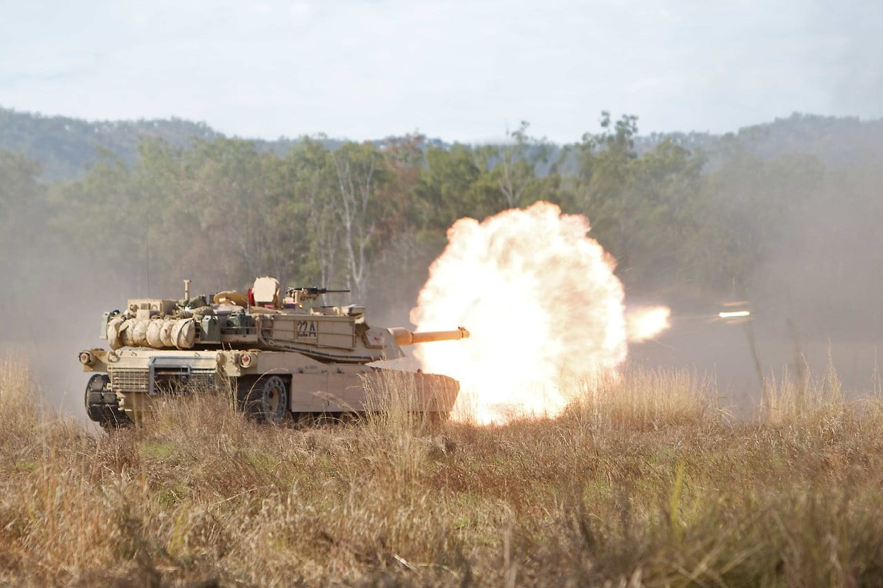 fighting, M1 Abrams, mode of transportation, battle, day, armed forces, armored tank, field, grass, motion, plant, military, conflict, 720P, outdoors, HD Wallpaper