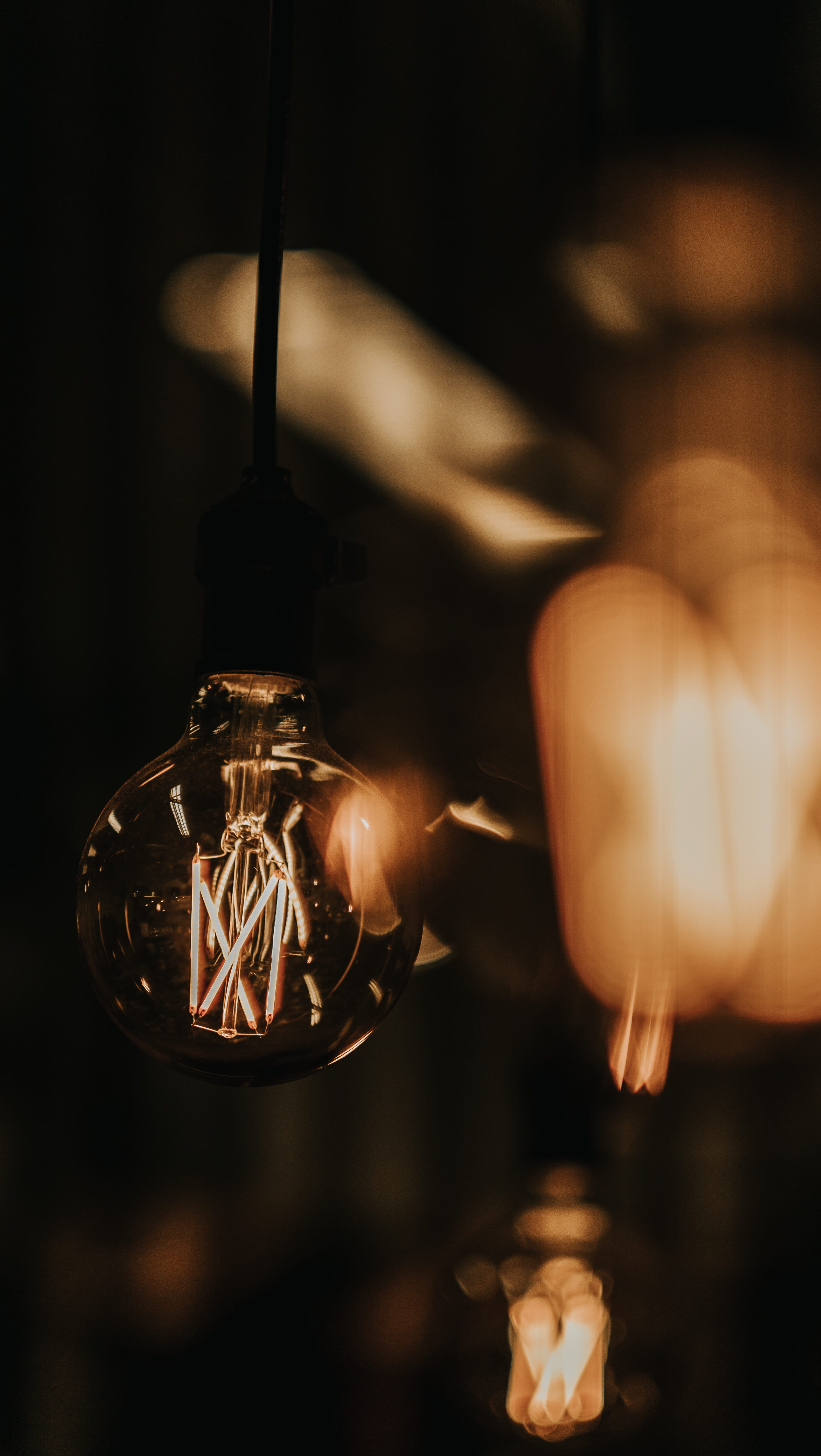 one person, indoors, vintage, close-up, retro, human body part, electric light, filament, closeup, yellow, power, depth of field, energy, hand, Phone HD Wallpaper