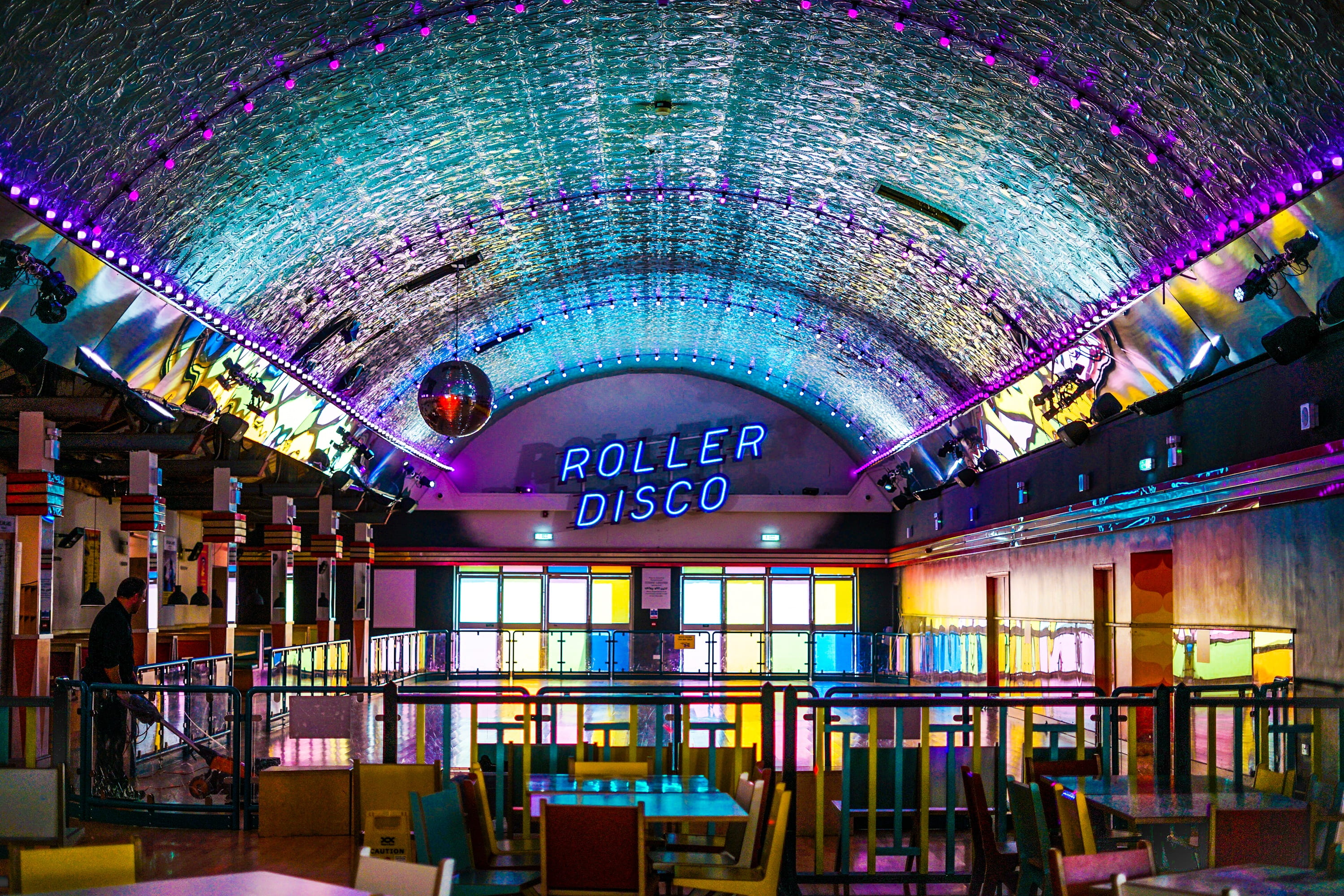 western script, disco, roller skating, neon, building, transportation, lighting equipment, foreign, built structure, tables, ceiling, text, arts culture and entertainment, HD Wallpaper