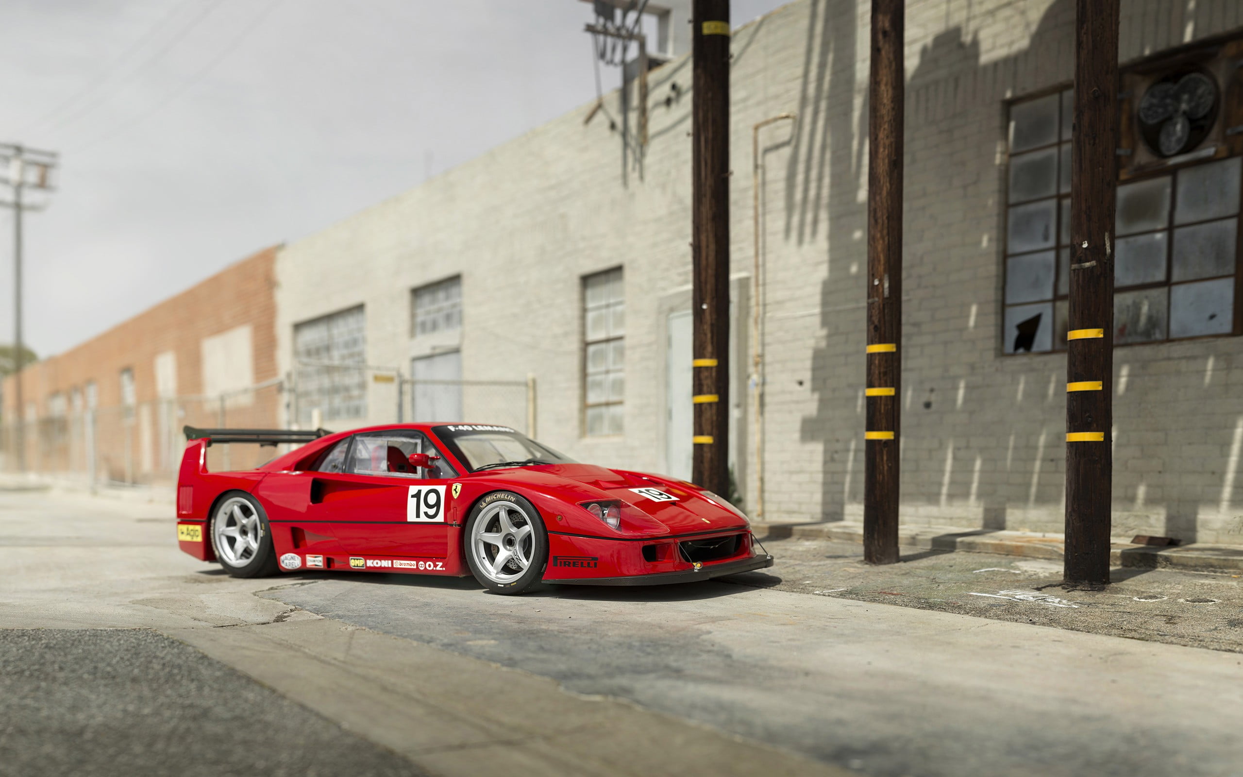 Ferrari F40, transportation, city, road, mode of transportation, motor vehicle, building, building exterior, outdoors, land vehicle, street, depth of field, HD Wallpaper