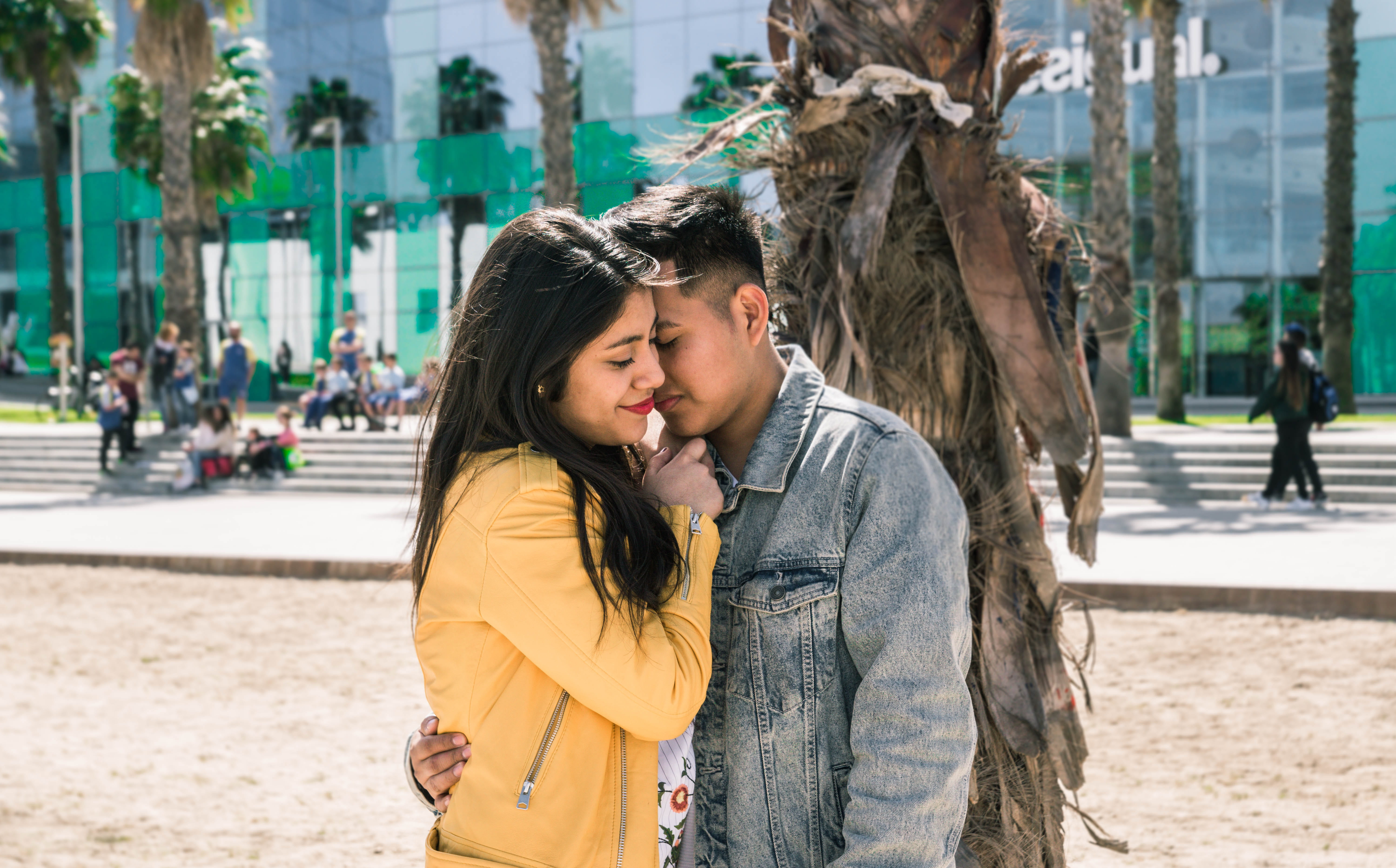 togetherness, young adult, vacation, hug, real people, city, urban, two people, dating, apparel, day, face, incidental people, leisure activity, jeans, HD Wallpaper
