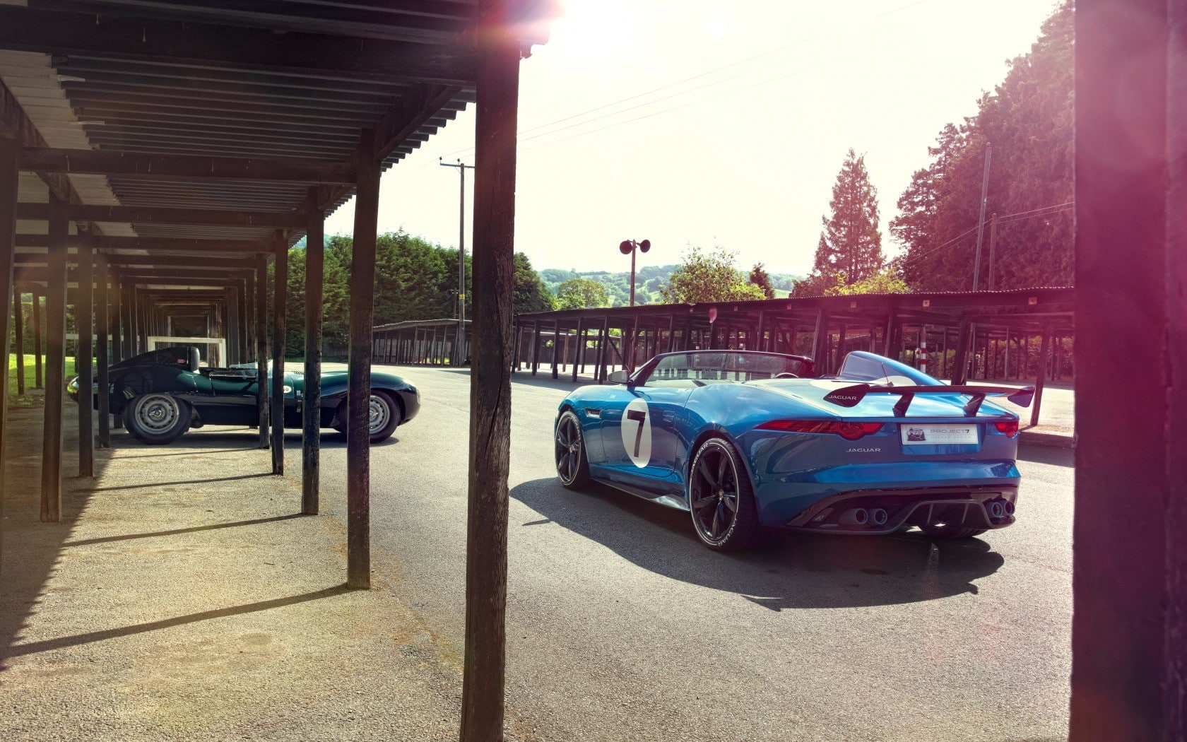 plant, building exterior, Jaguar F-Type, land vehicle, nature, sky, sunlight, parking, travel, car, tree, Jaguar, road, no people, 720P, mode of transportation, HD Wallpaper