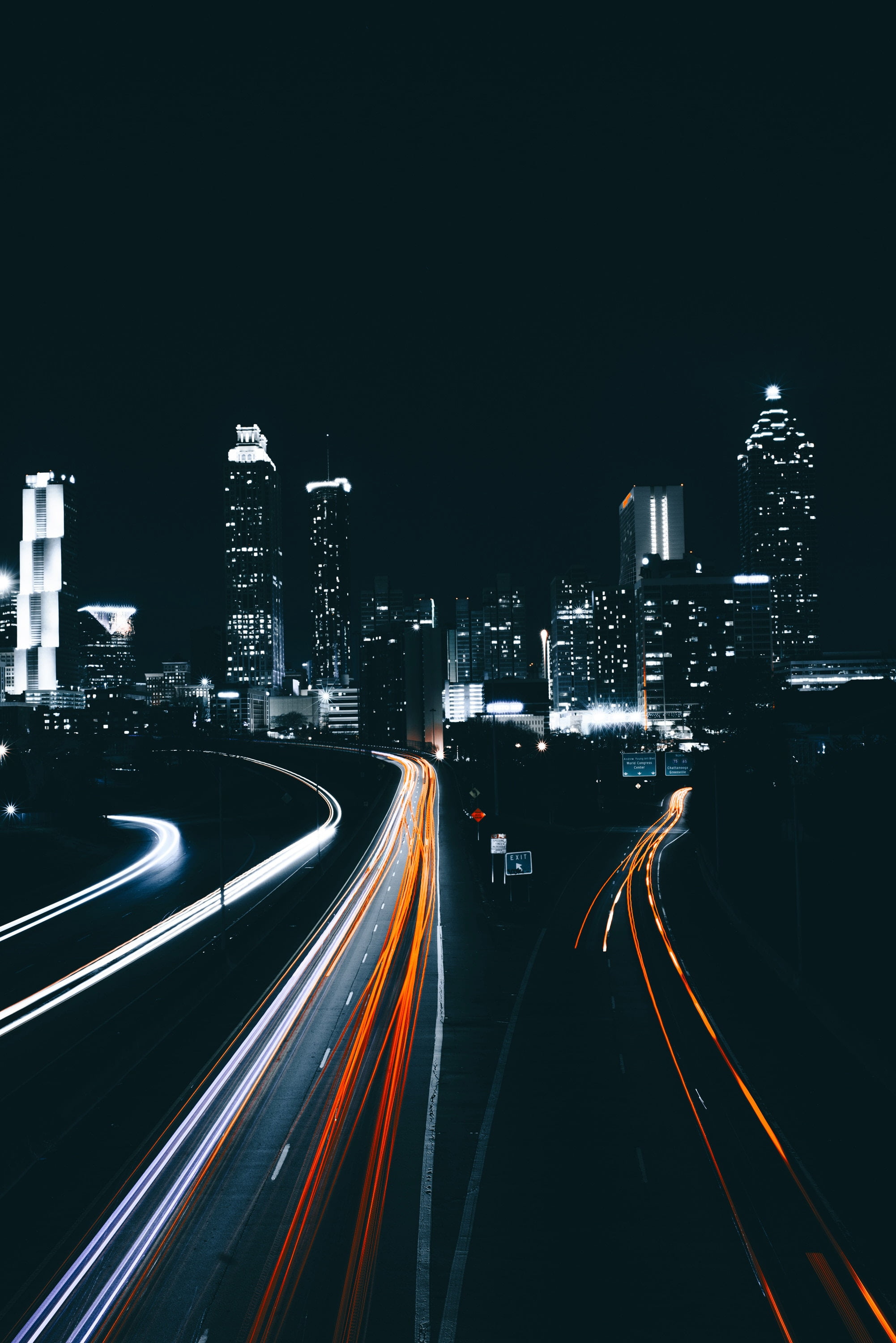 building exterior, motion, tail light, light trail, long exposure, buildings, architecture, high angle view, street, skyscraper, speed, modern, usa, road, Phone HD Wallpaper