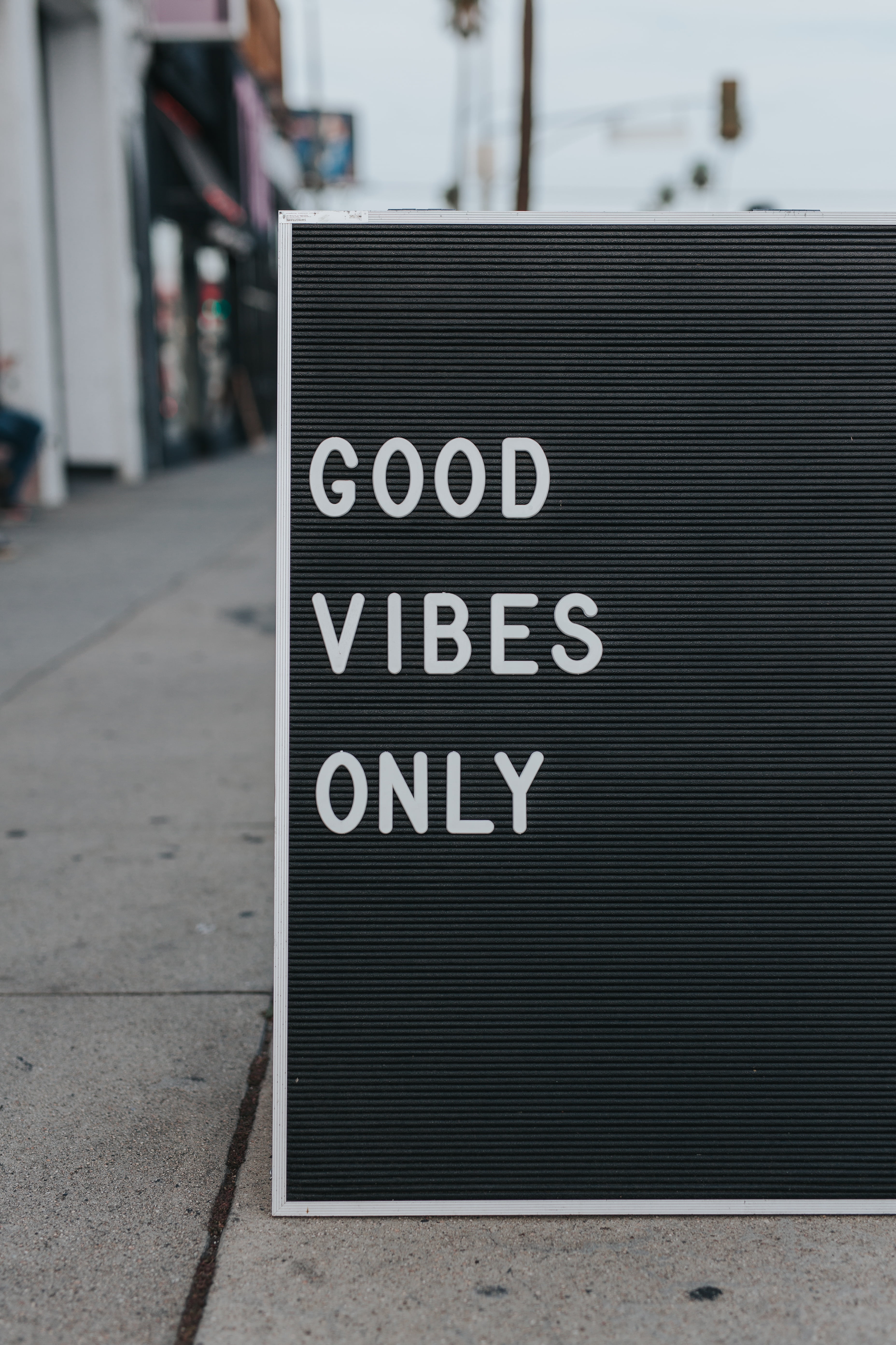 text, information, sign, day, communication, black, road, city, built structure, street, outdoors, good, vibes, 5K, capital letter, print, focus on foreground, Phone HD Wallpaper