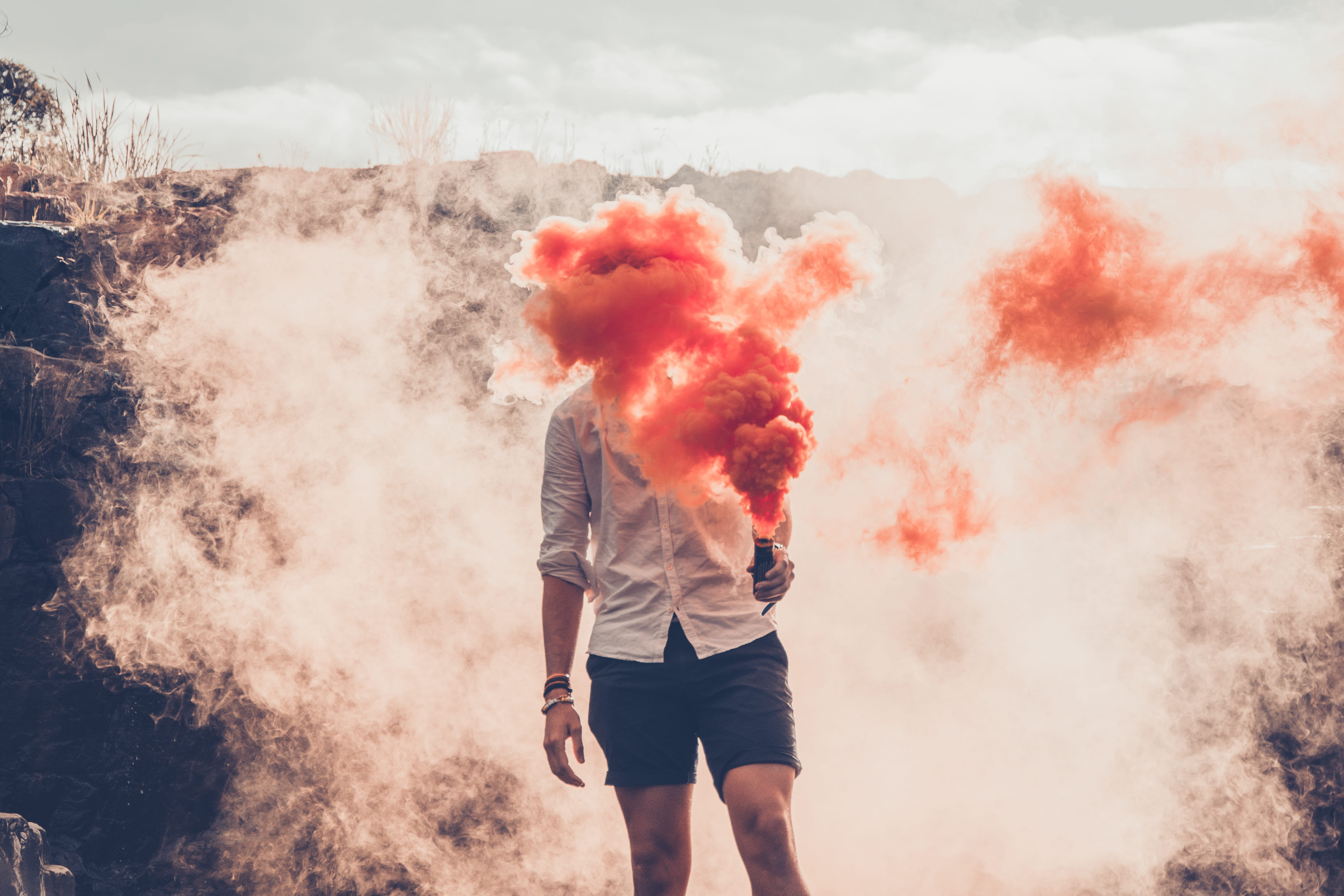 young adult, wear, adult, covering, real people, casual clothing, recreation, day, holding, daylight, warning sign, shorts, standing, 4K, smoke, young men, HD Wallpaper