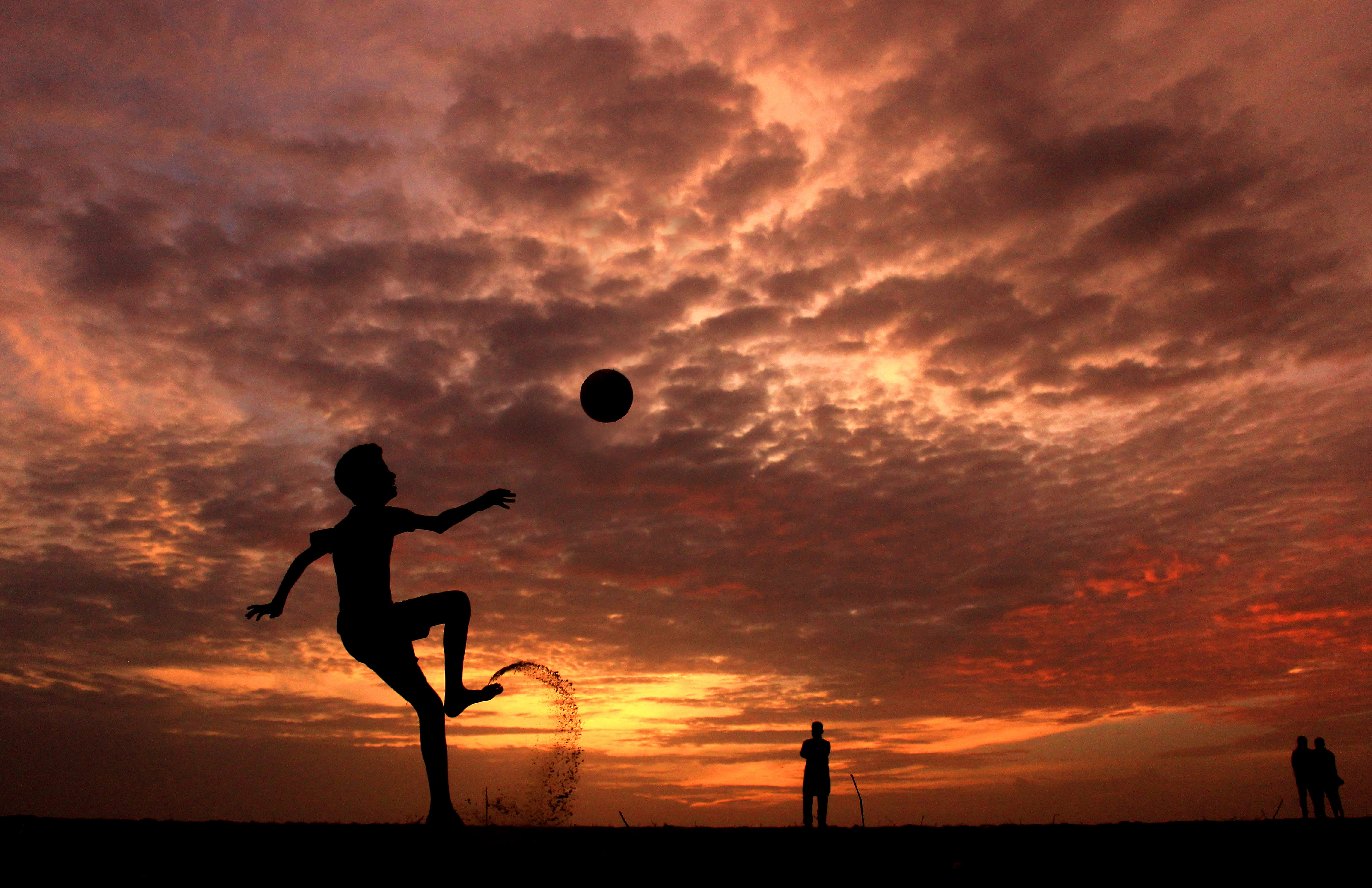 determination, dawn, happiness, sport, men, child, team sport, people, mid-air, sun, action, recreation, evening, play time, cloudy sky, leisure activity, HD Wallpaper