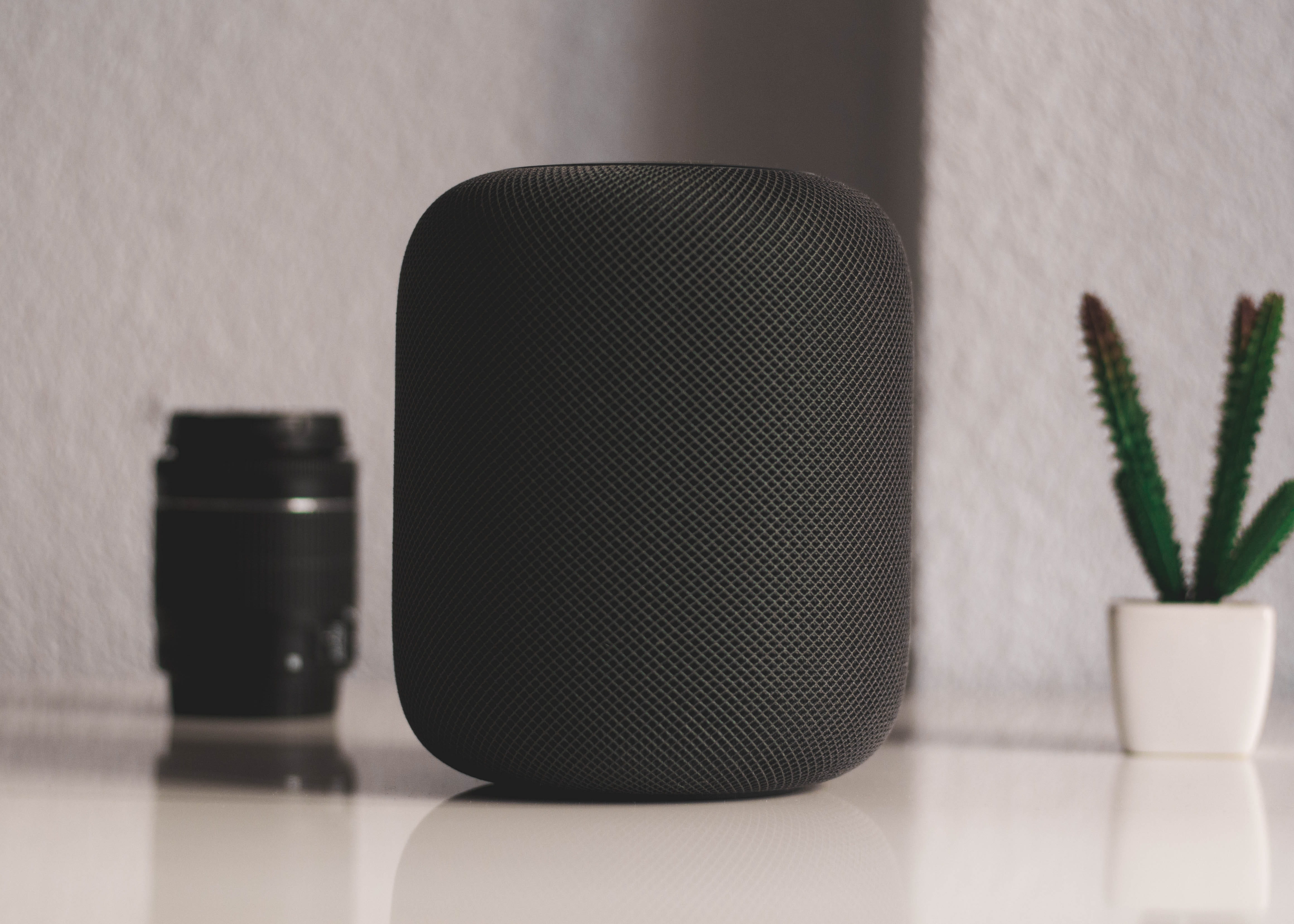 ipod, portable, black color, speaker, phone, cell phone, apple, simplicity, camera lens, plant, focus on foreground, pattern, mobile phone, still life, HD Wallpaper