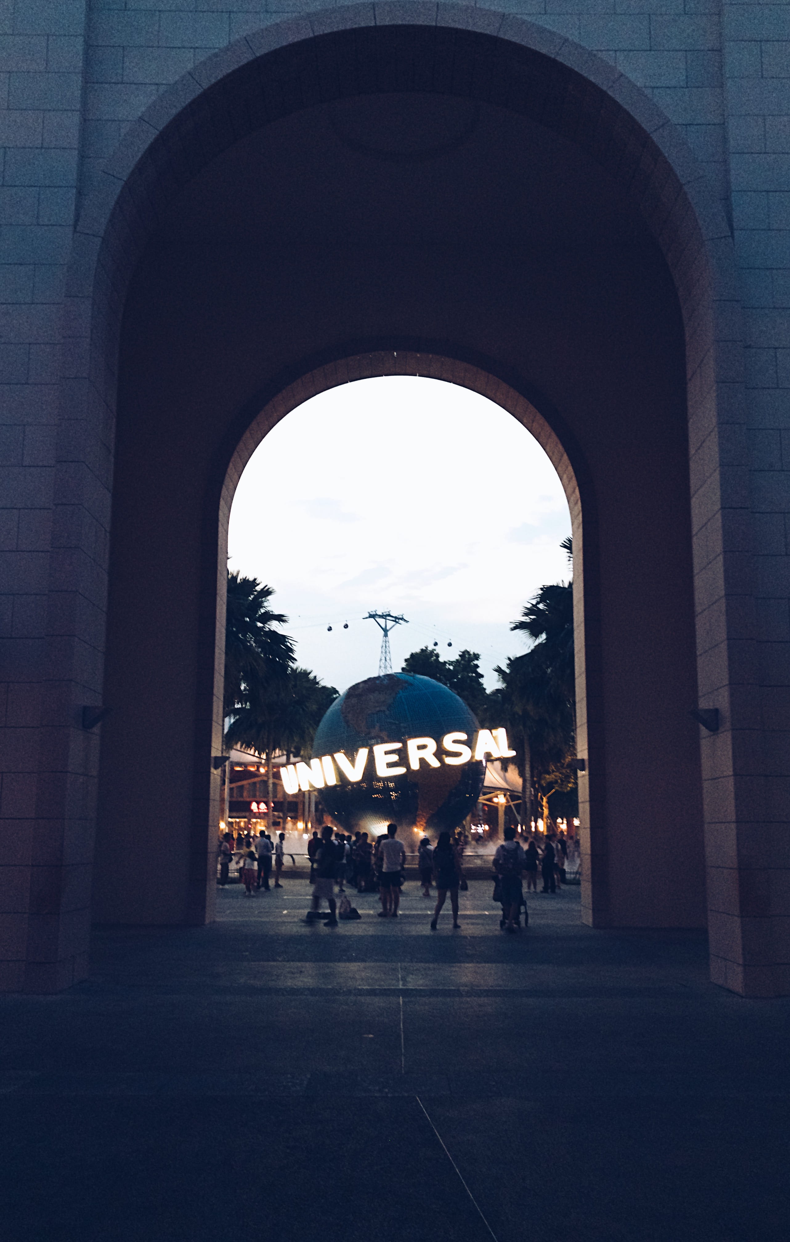 universal ball, adult, mammal, outdoors, singapore, sky, street, universal, architecture, domestic, dark, crowd, built structure, blue, group of people, Phone HD Wallpaper