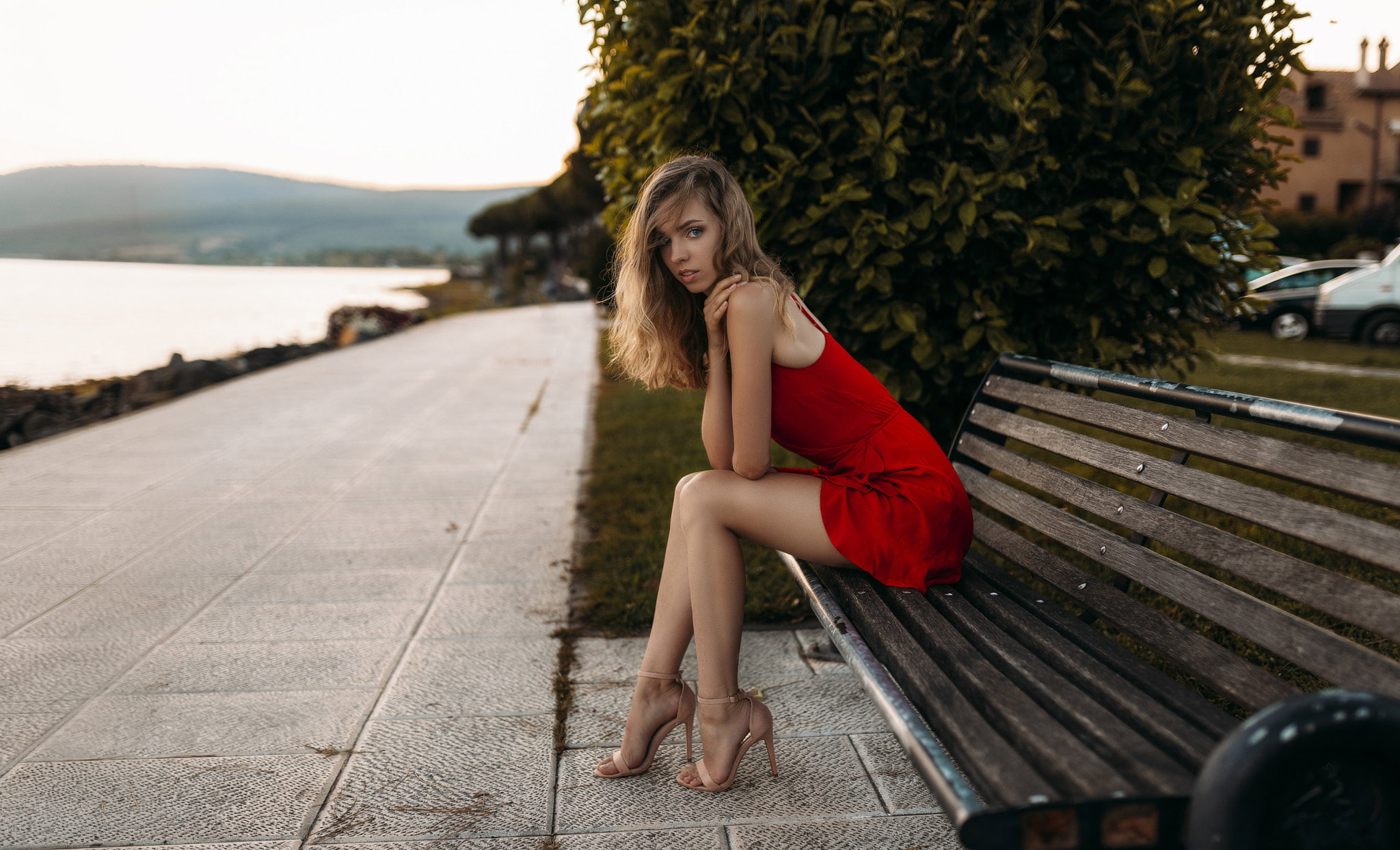 hair, beautiful woman, full length, young adult, looking at camera, fashion, blue eyes, sitting, beauty, bench, outdoors, red dress, hairstyle, long hair, HD Wallpaper