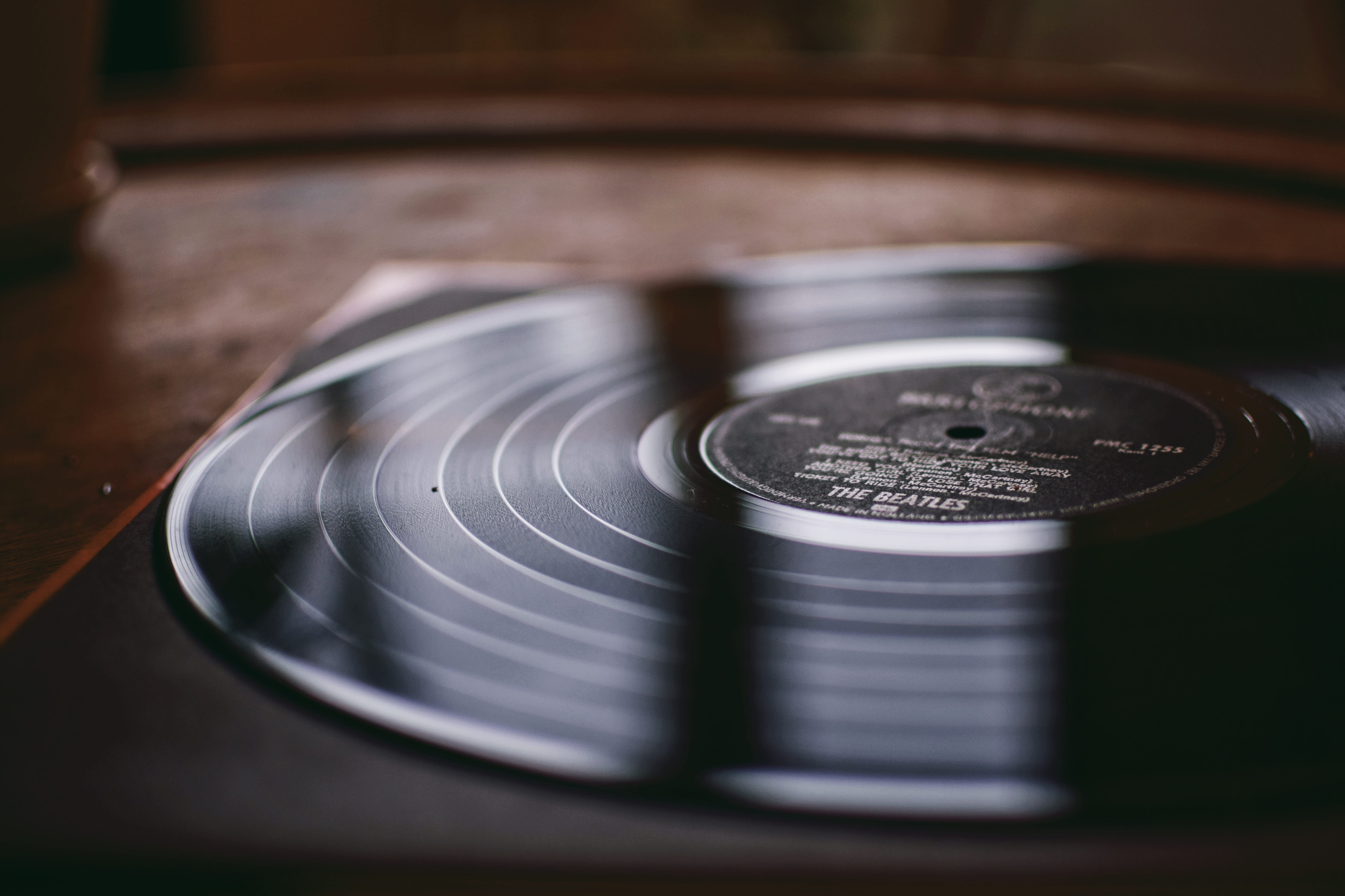 text, disk, geometric shape, shape, arts culture and entertainment, table, indoors, retro, black, circle, dish, shallow, focus on foreground, sundial, design, HD Wallpaper