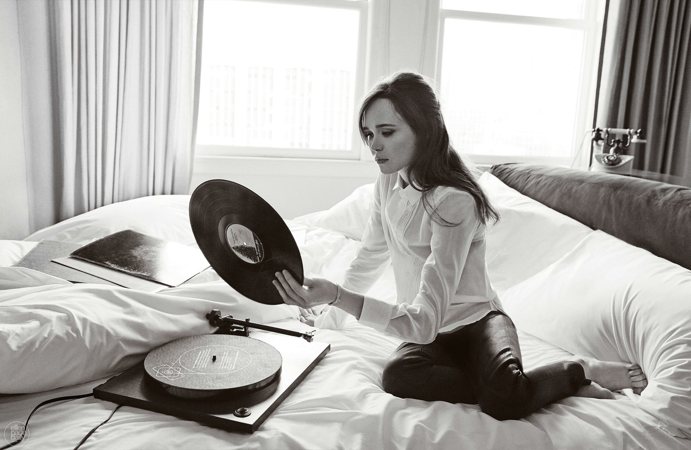 in bed, leather pants, telephone, barefoot, long hair, gramophone, sitting, actress, monochrome, women, vinyl, 1080P, brunette, curtain, Ellen Page, blouses, HD Wallpaper