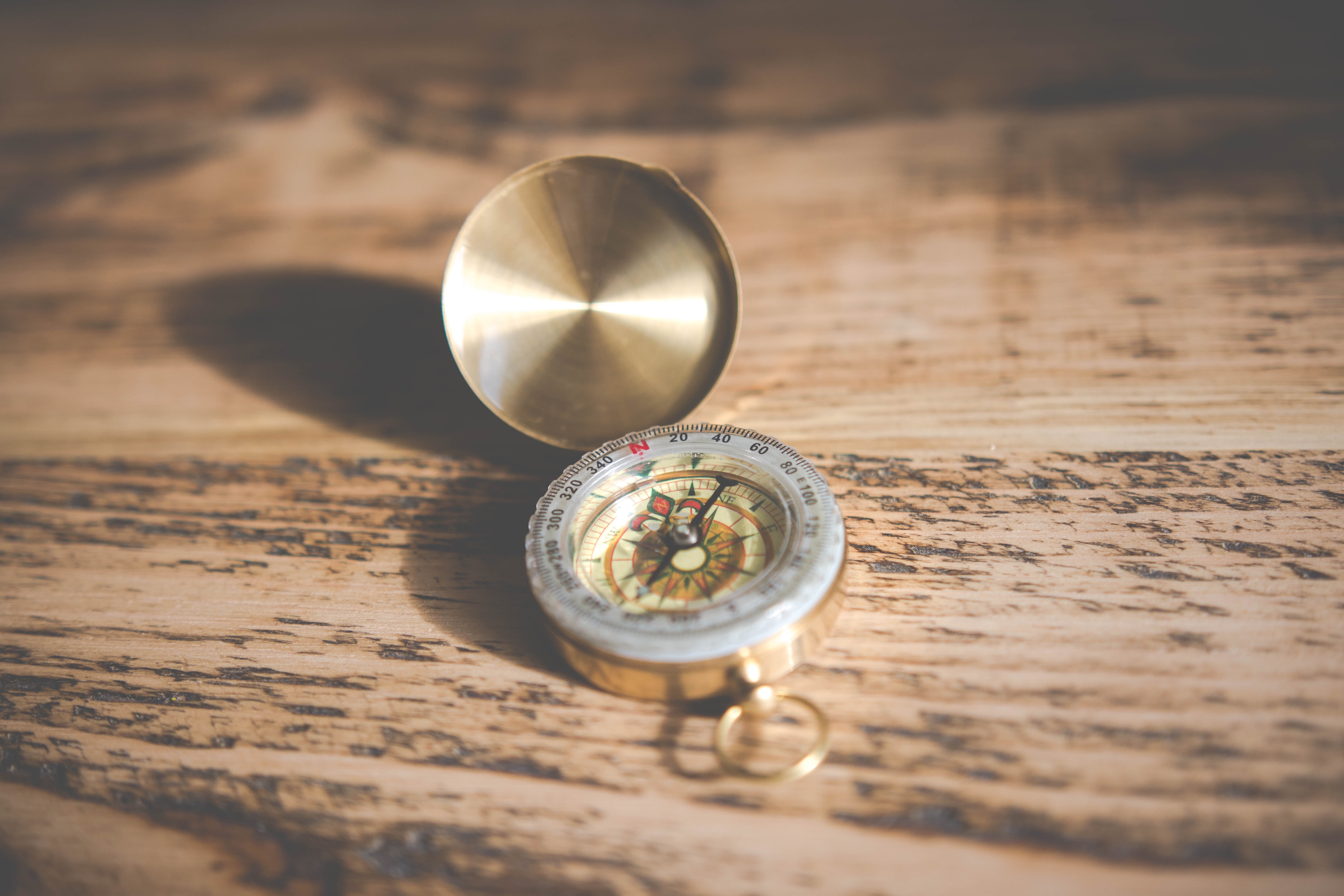 wood - Material, direction, south, guidance, table, north, silver colored, wood grain, transparent, still life, luxury, jewelry, 5K, circle, journey, gold, HD Wallpaper