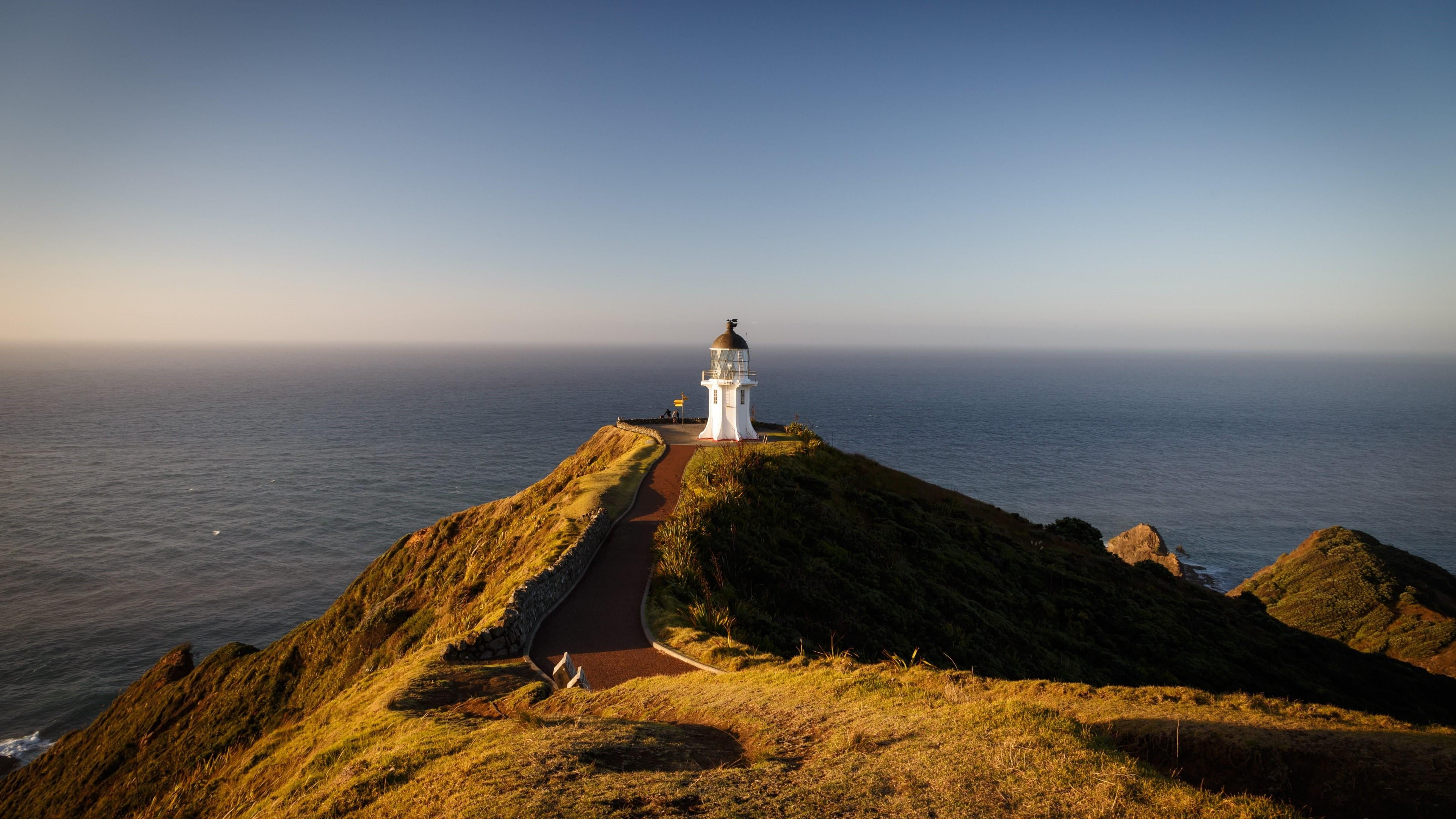 blue sky, architecture, sea, building exterior, built structure, cape, land, lighthouse, vacations, ocean, horizon, coast, direction, clear sky, scenics - nature, HD Wallpaper