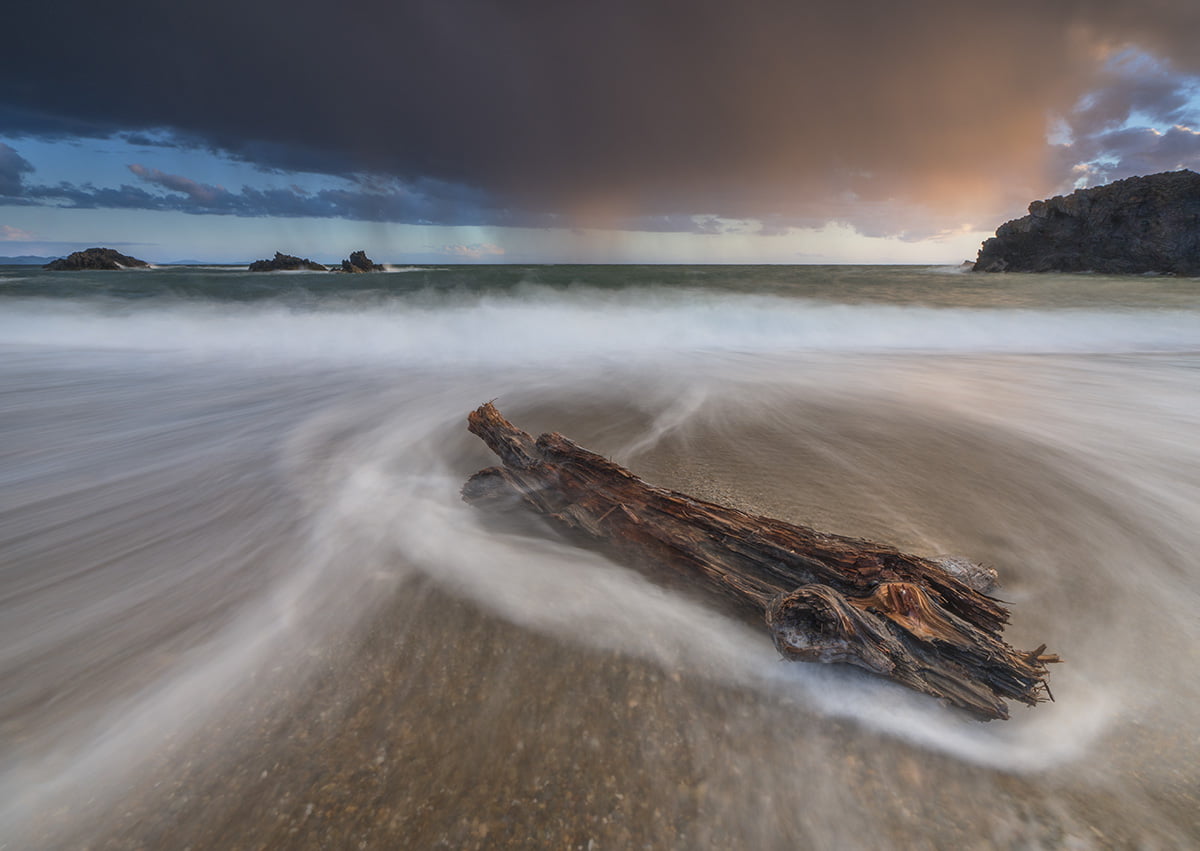 rock - Object, seascape, newborough, sea  waves, coast, coastline, sea, LE, rain, Mawr, ynys mon, Porth, Anglesey, tree trunk, cloud, dead tree, long exposure, HD Wallpaper